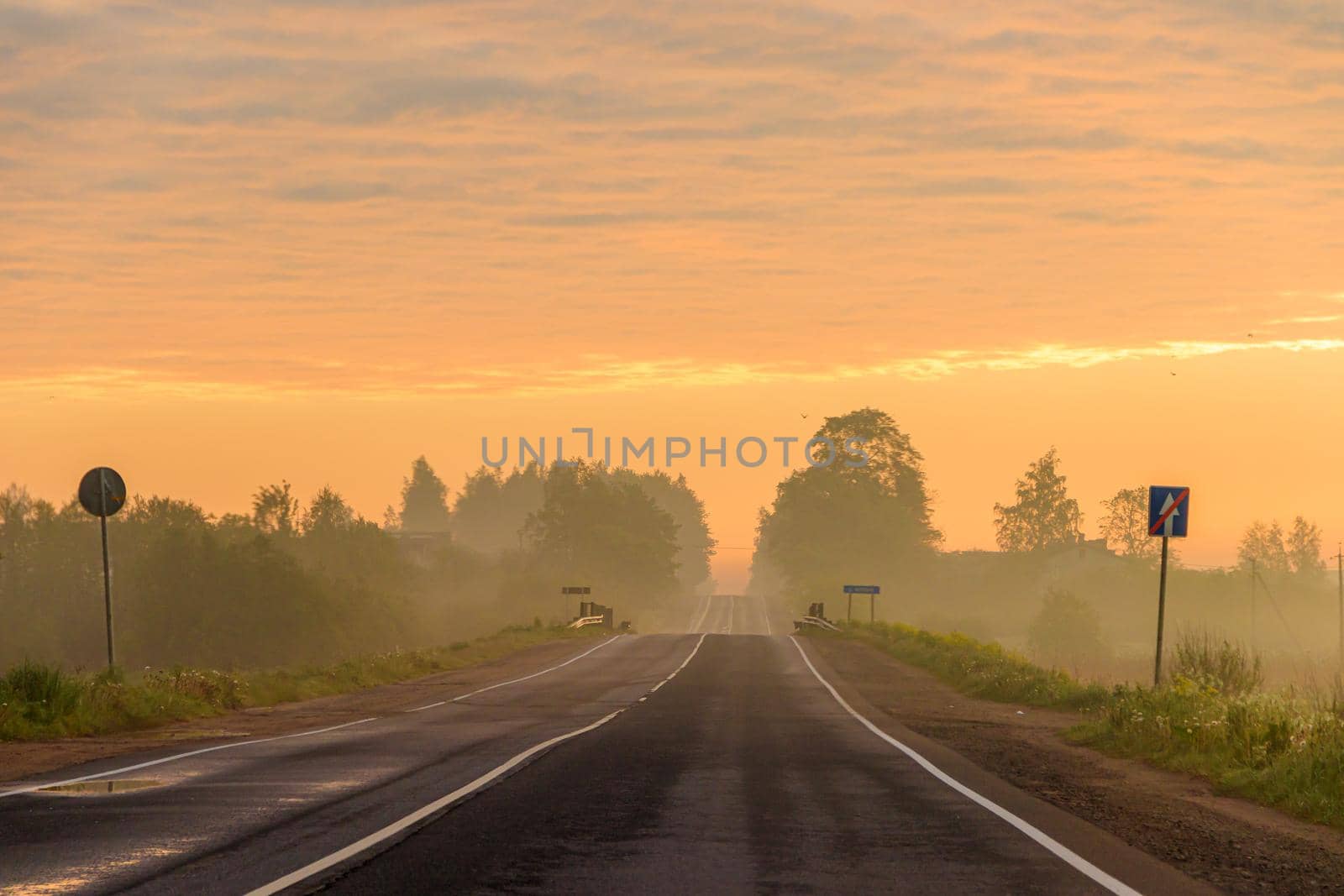 Highway at dawn . Beautiful road. Road landscape. Travel by car. The article is about travel.