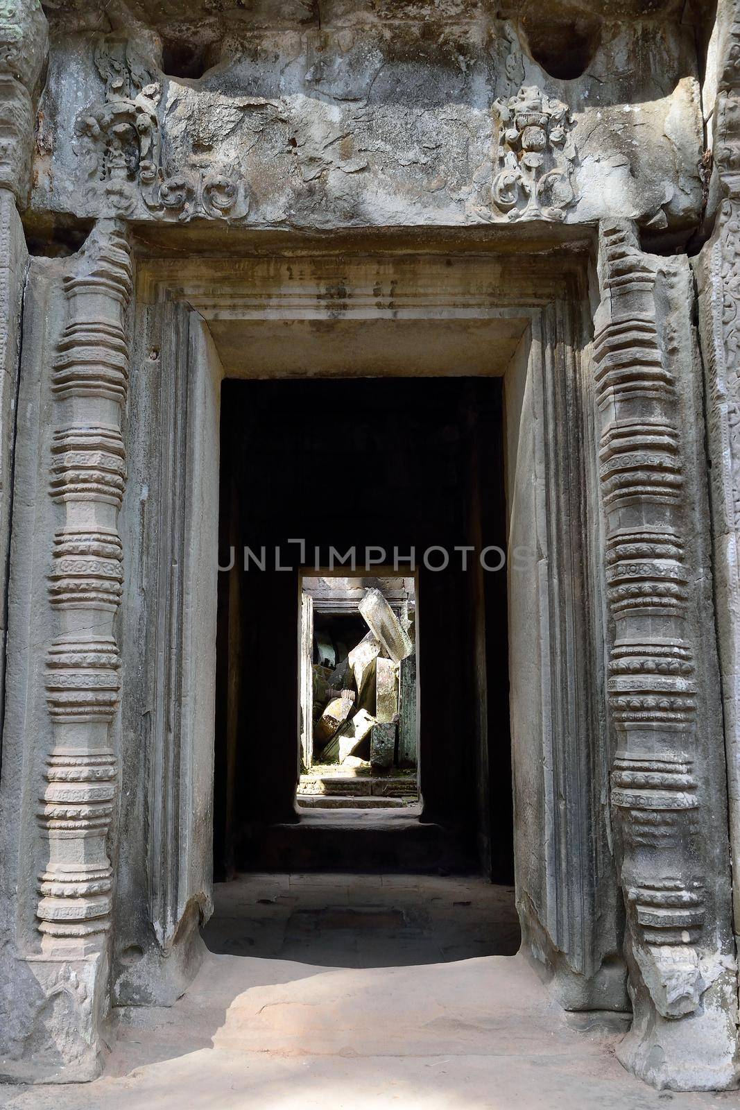 Temple in the Angkor complex, Siem Reap, Cambodia. by silentstock639