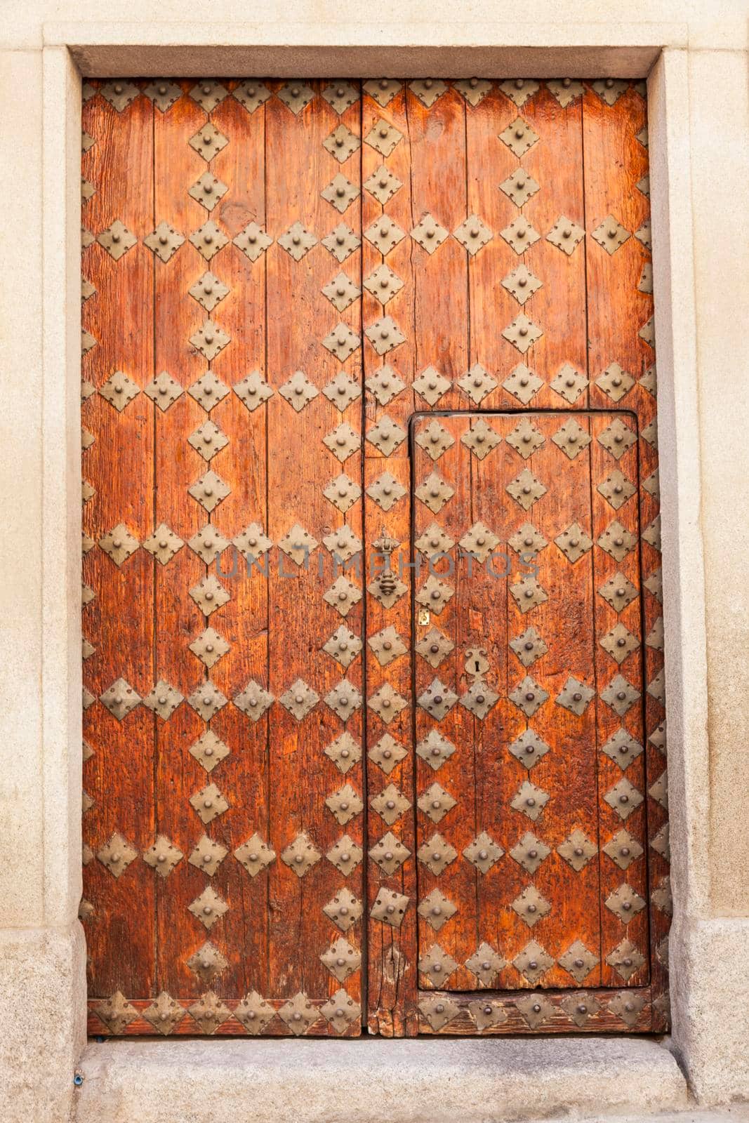 Old door in Toledo by benkrut