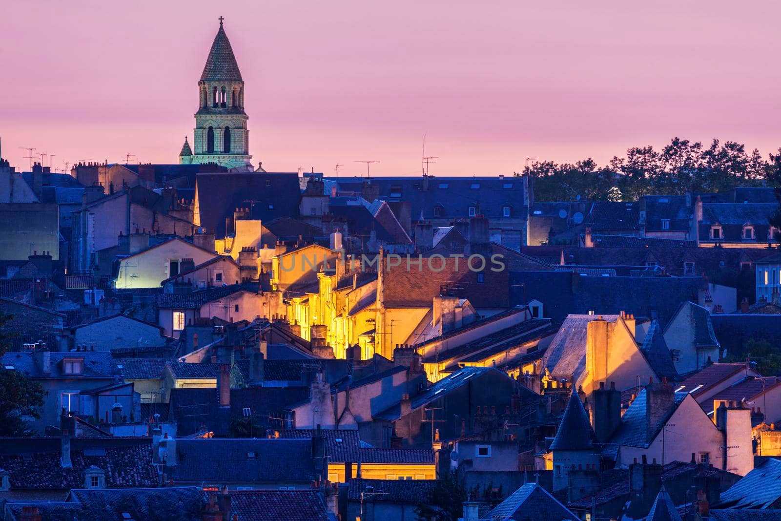 Panorama of Poitiers at sunset with Notre-Dame la Grande Church. Poitiers, Nouvelle-Aquitaine, France.