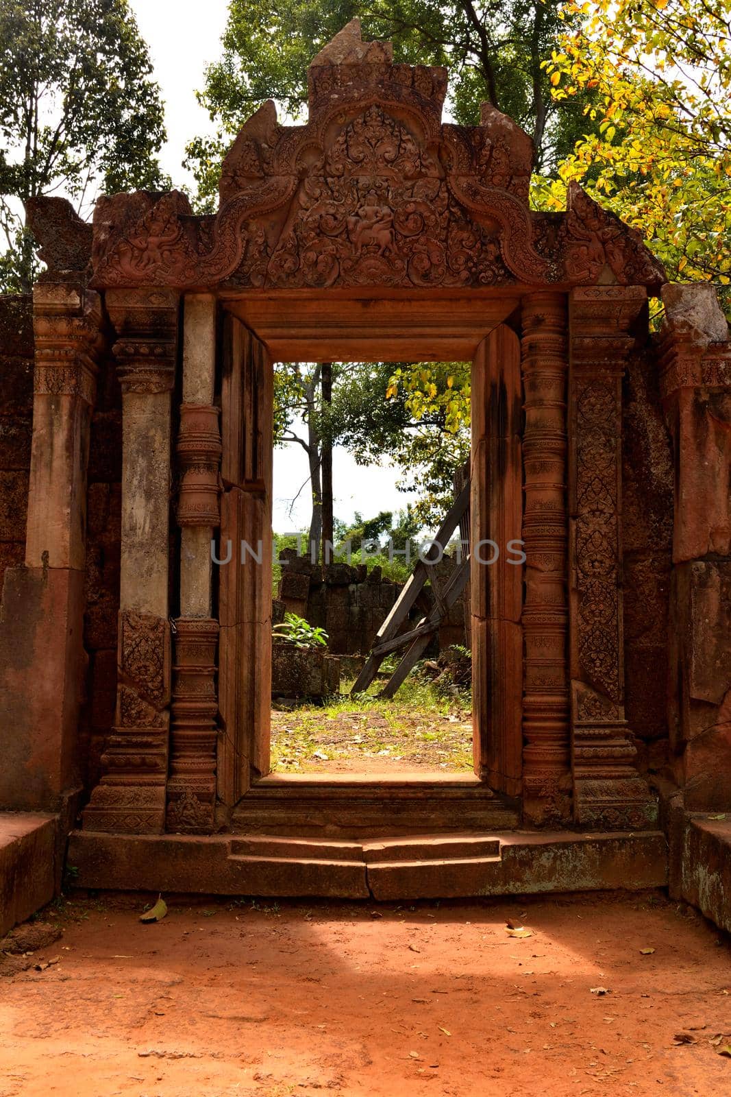 View of a door of a beautiful temple in the Angkor complex by silentstock639