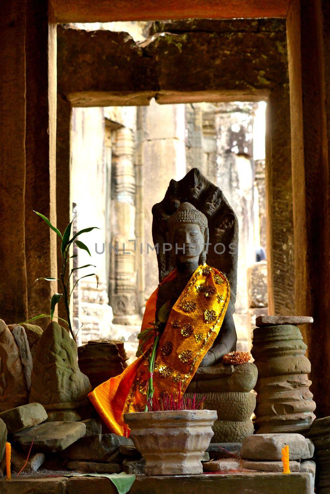 View of a beautiful statue adorned in the Bayon temple in the Angkor Thom complex, Cambodia