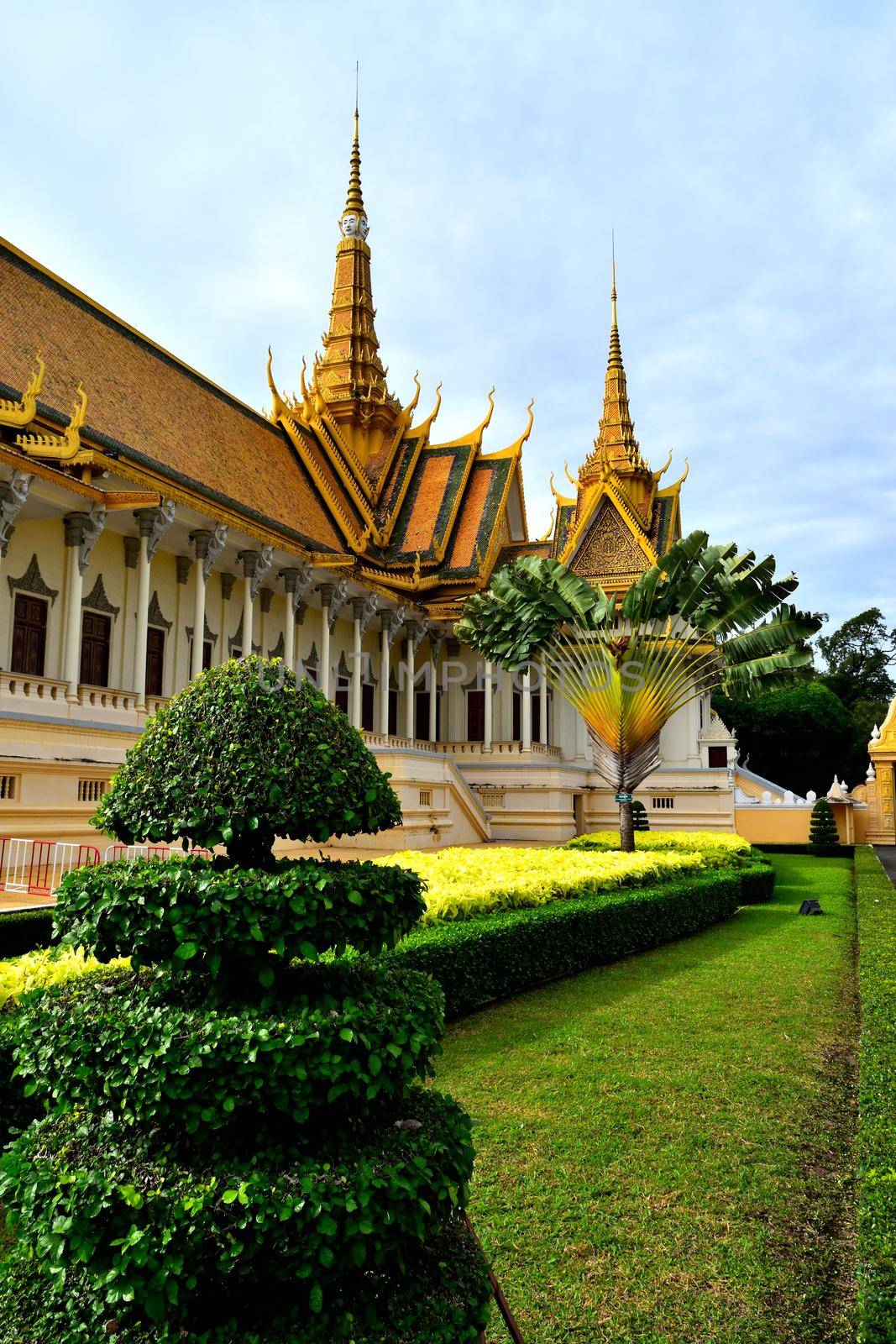 View of a building and adjacent gardens in the Royal Palace complex of Phnom Penh, Cambodia