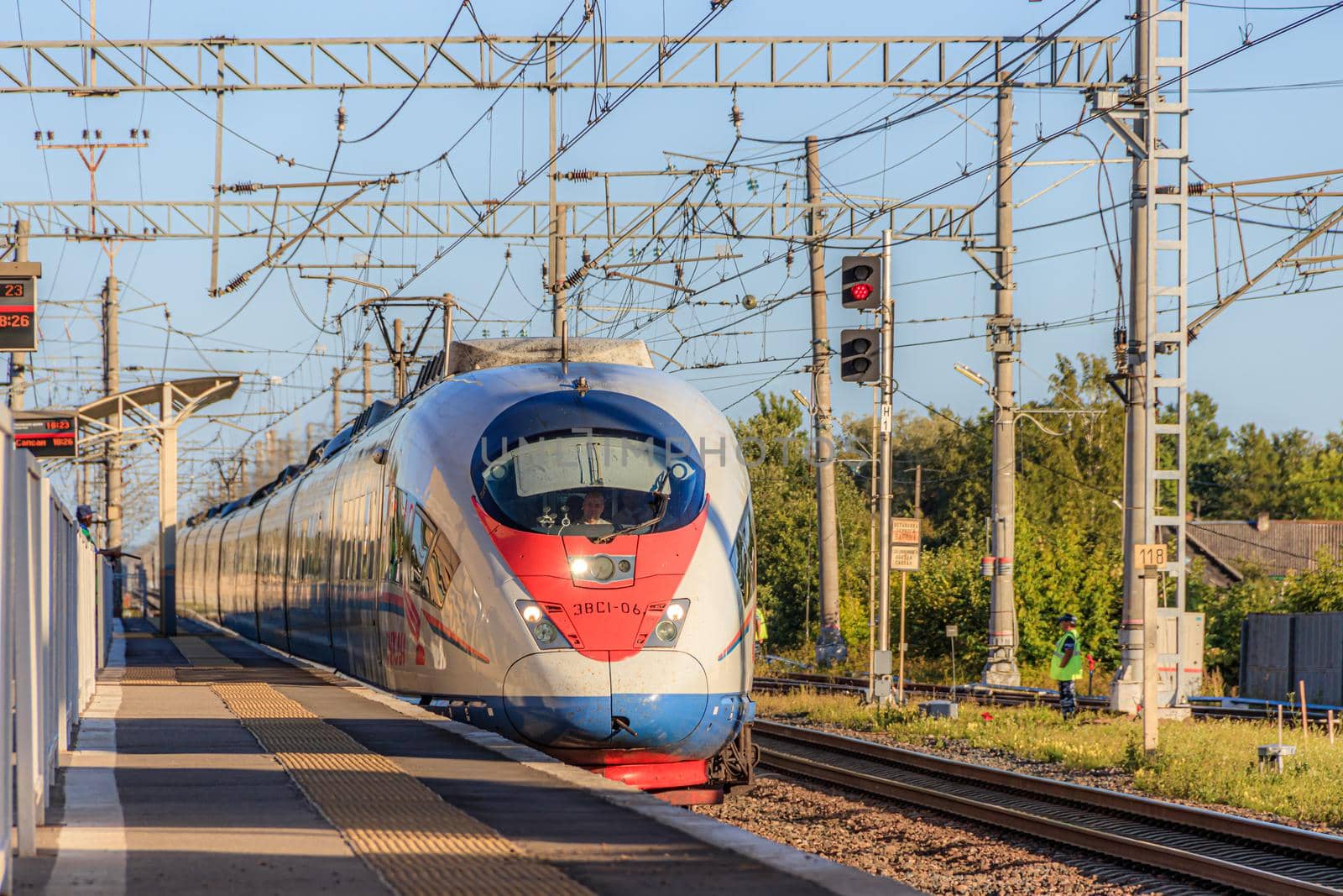 Peregrine Falcon stop . Speed train. The Route Moscow - Saint-Petersburg. the transportation of passengers. Transport. Russian railway. Train ticket. Travel around the country. Trip to the capital. Prices for railway tickets. Russia, Novgorod region, Chudovo, August 17, 2020