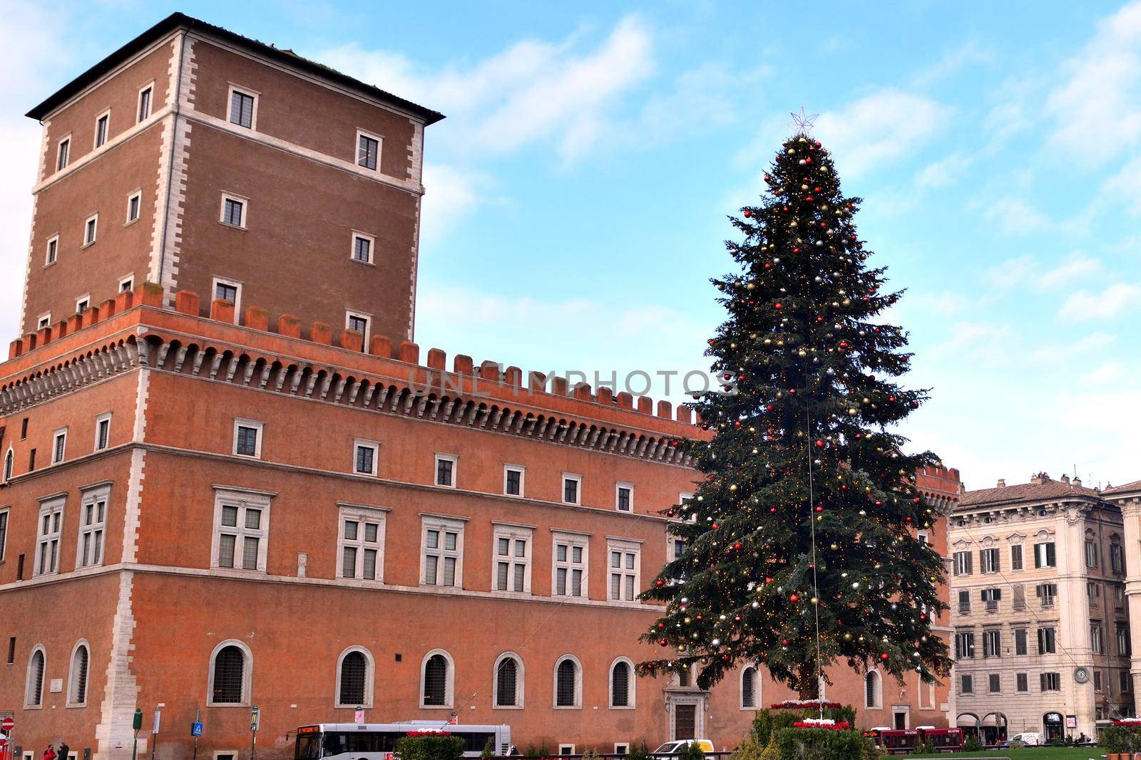 View of the famous Christmas tree in Piazza Venezia with few tourists due to the Covid19 epidemic.