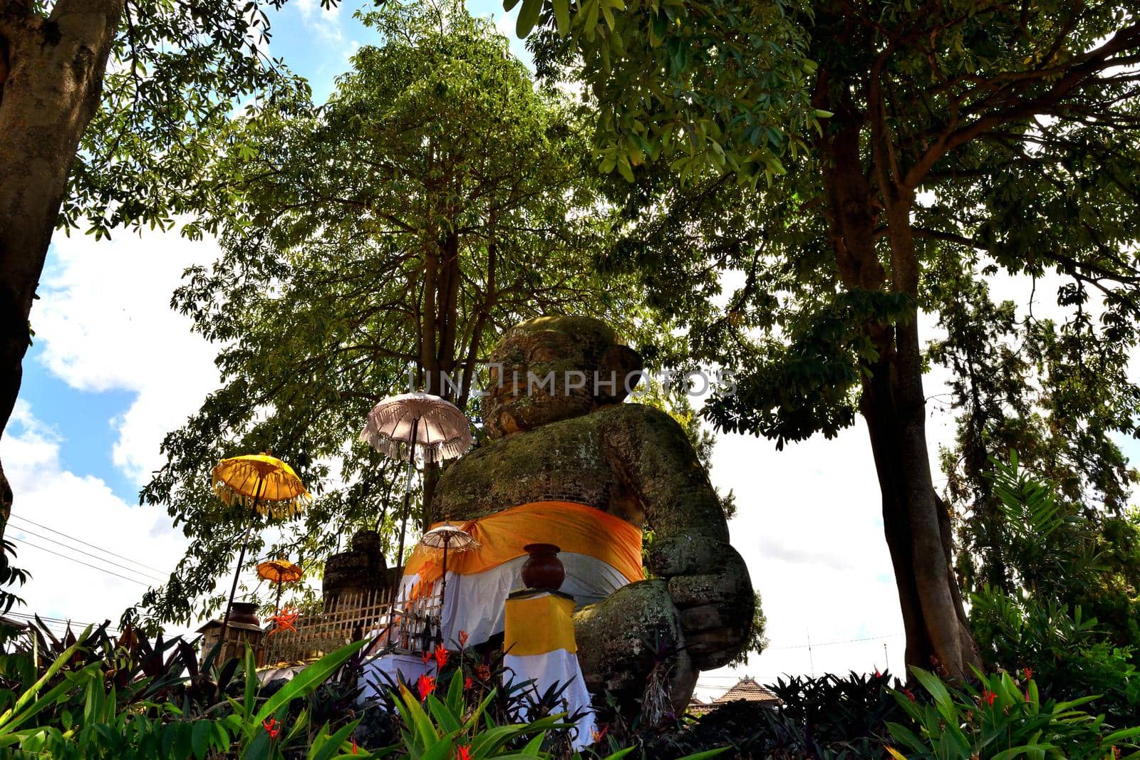 A wonderful holy statue in a temple by silentstock639