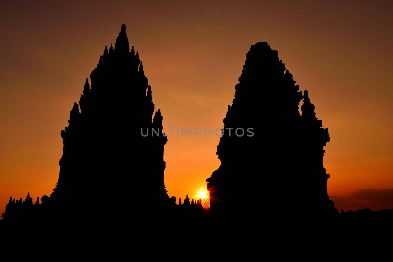 Sunset view of the Prambanan Hindu temple by silentstock639