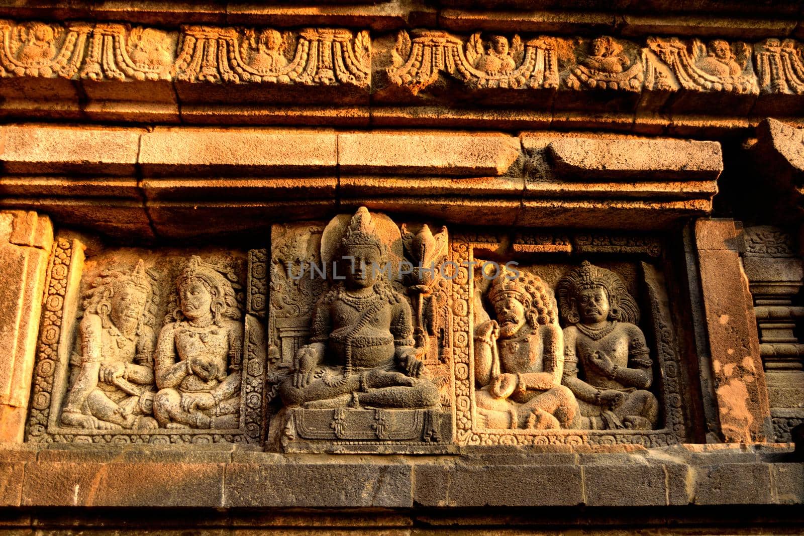 Closeup of the bas-relief of the Prambanan Hindu temple by silentstock639