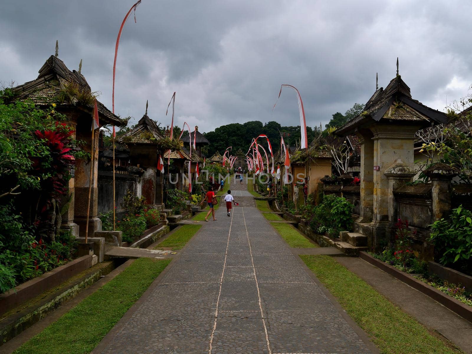 Penglipuran village in a cloudy day, Bali, Indonesia by silentstock639