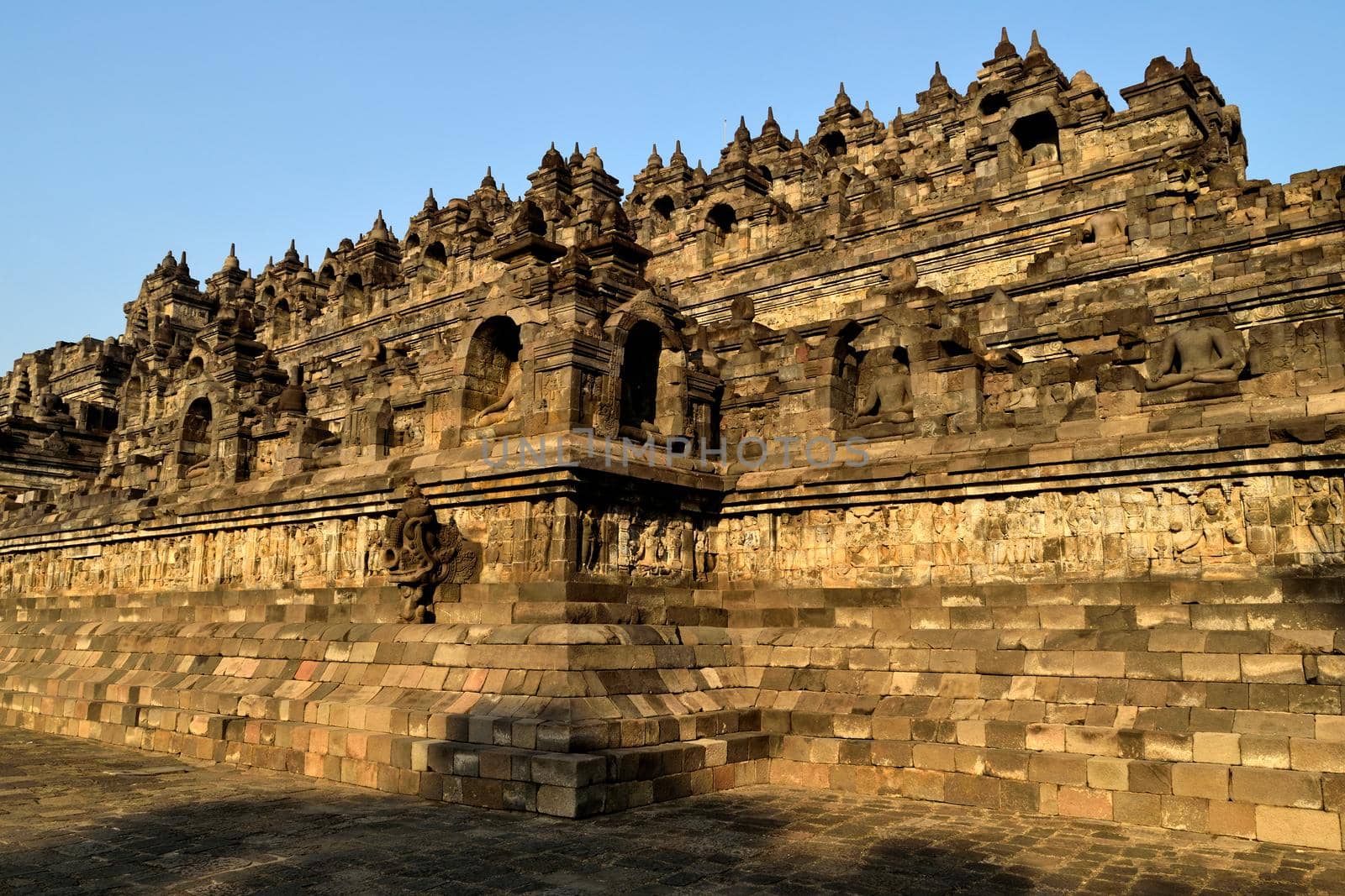 Dawn view of the Borobudur, Buddhist temple in Java by silentstock639