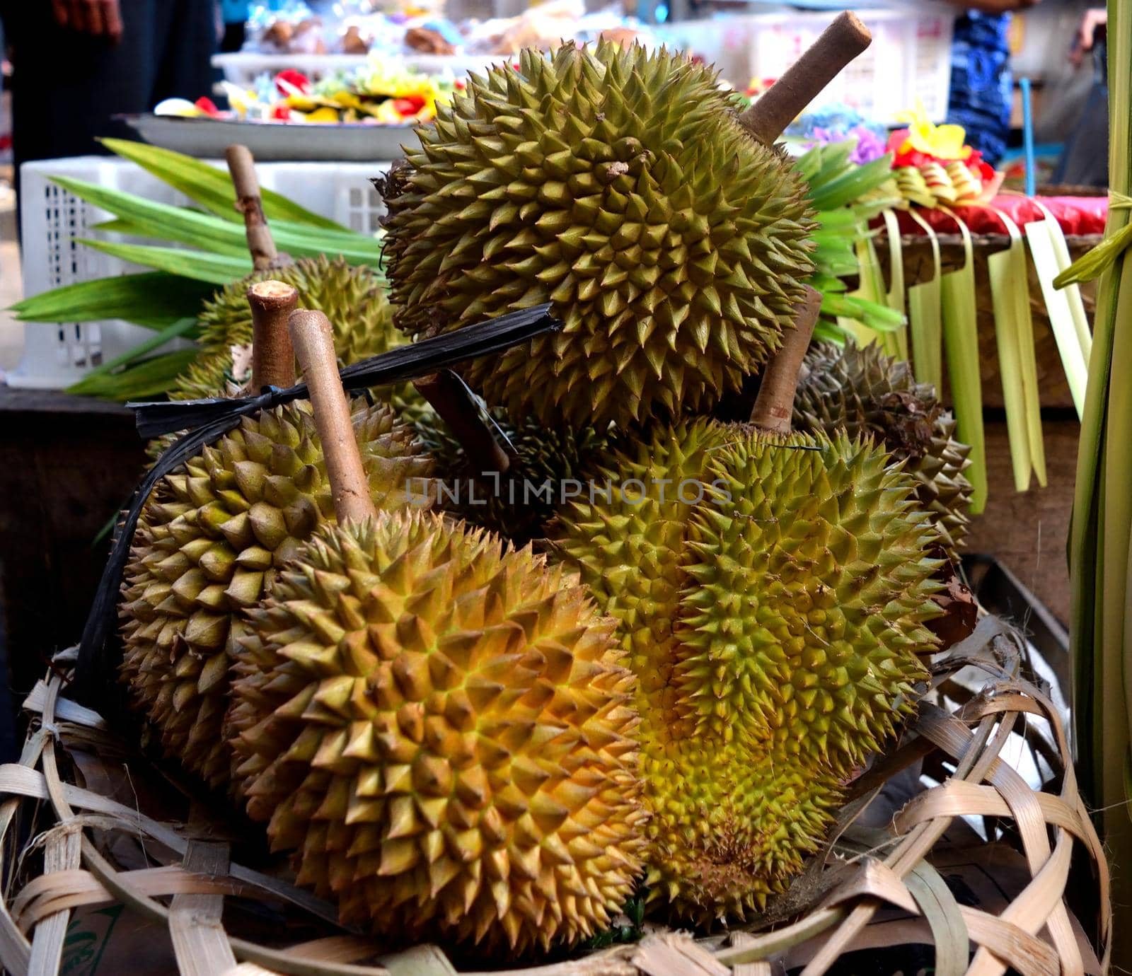 Closeup of Durian, famous stinking fruit, in a market in Bali by silentstock639