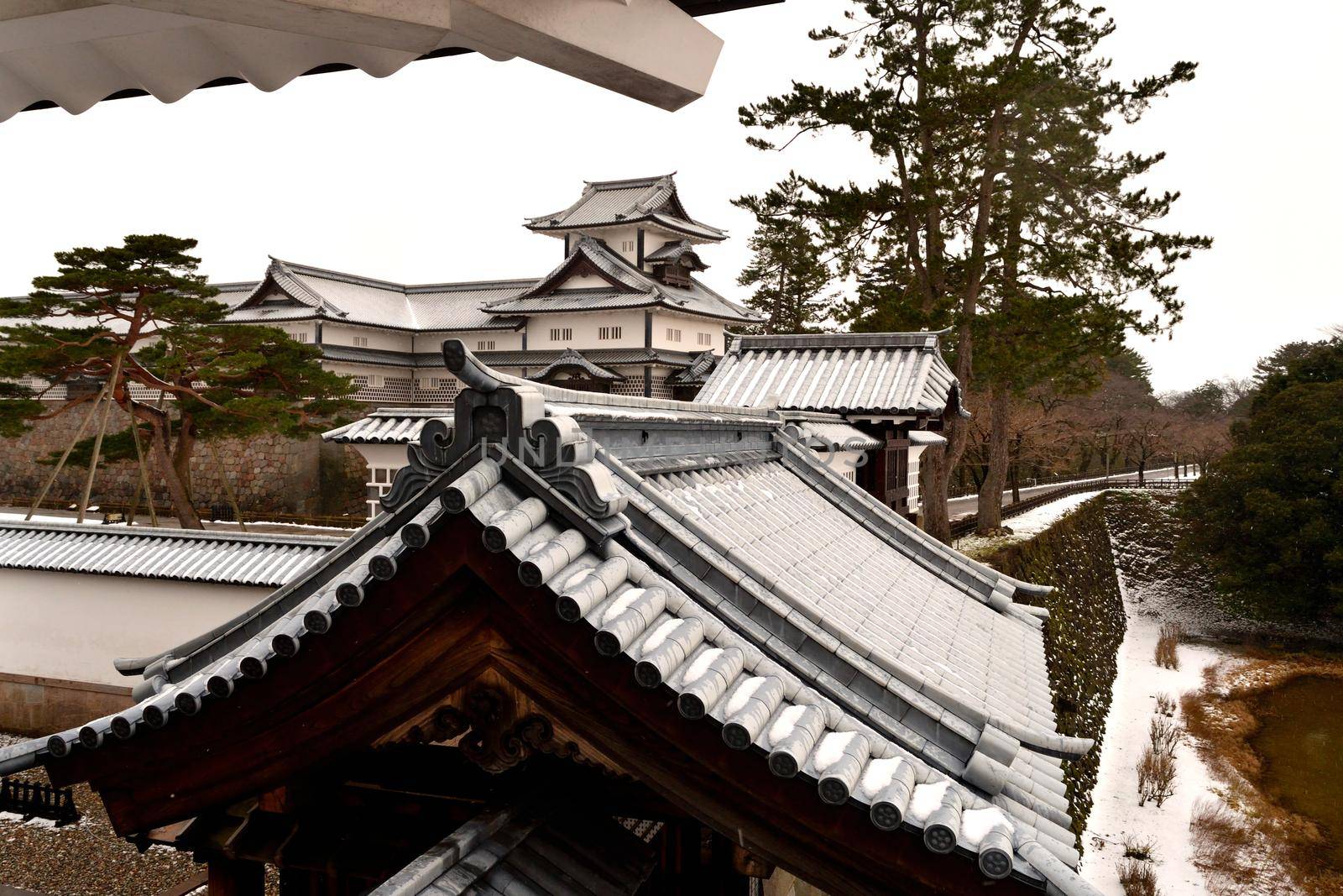 Closeup of Kanazawa castle during the winter season by silentstock639