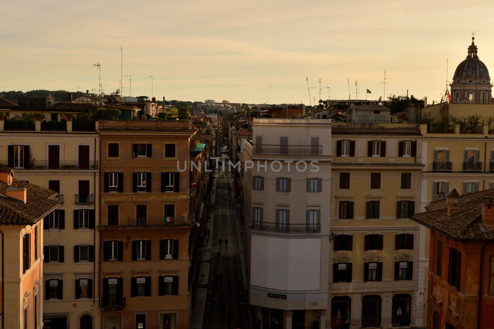 View of the Via dei Condotti without tourists due to the phase 2 of lockdown by silentstock639