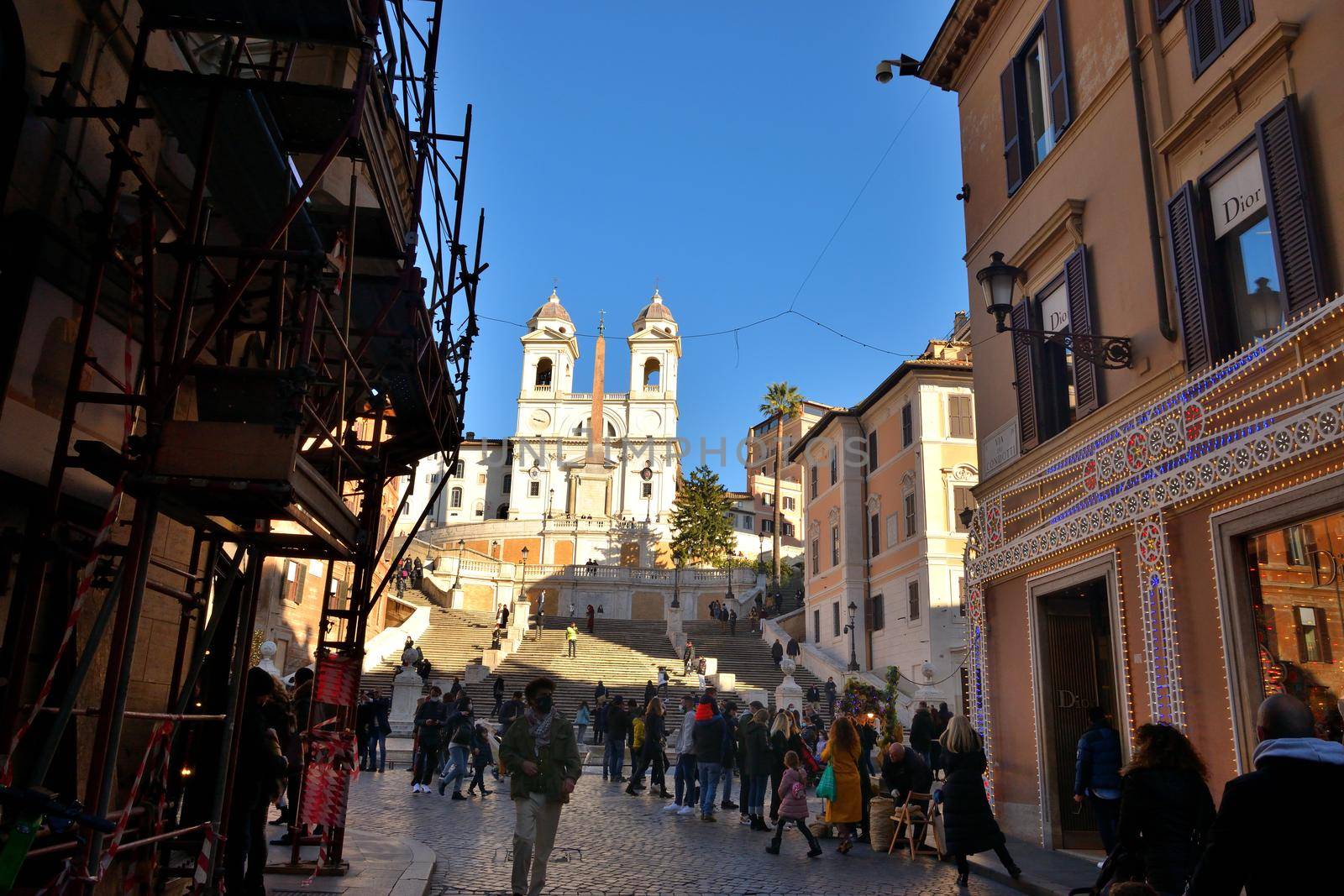 Rome, Italy, December 13th 2020. View of the Via dei Condotti and Trinita dei Monti during the Covid19 epidemic. by silentstock639