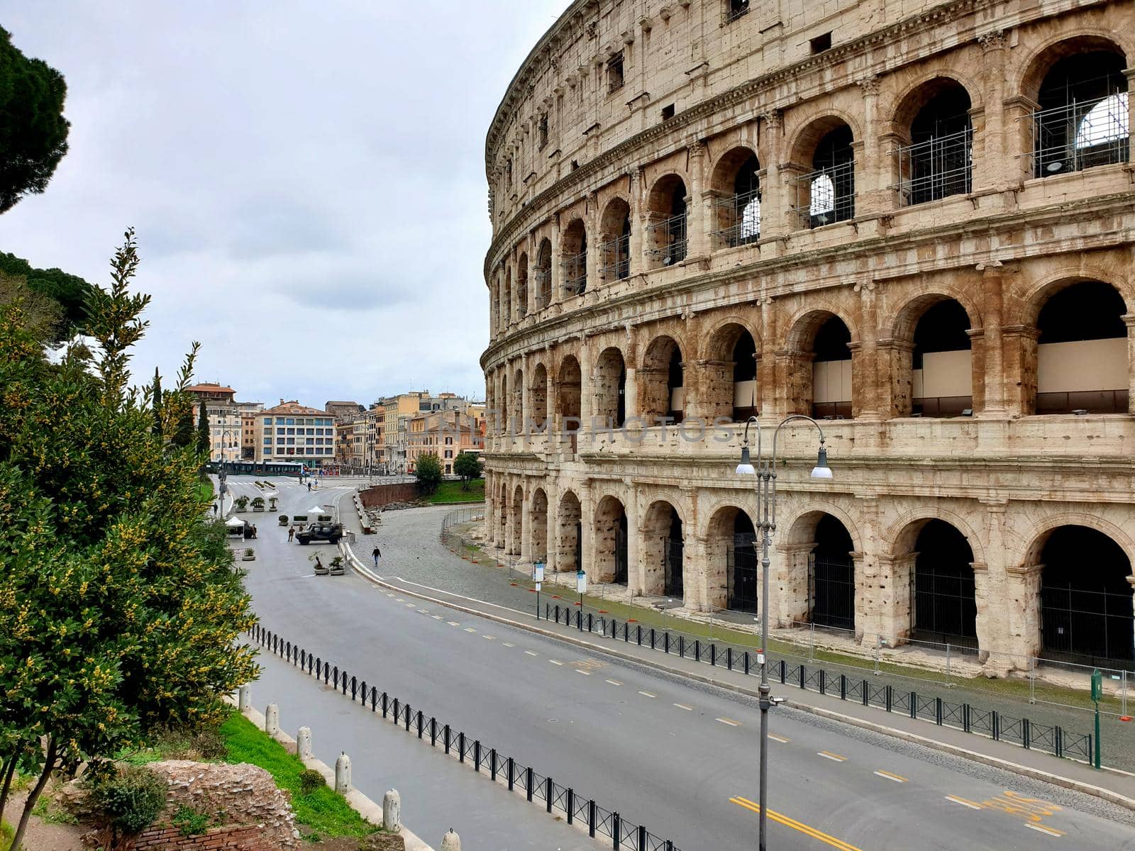 View of the Colosseum without tourists due to the quarantine by silentstock639