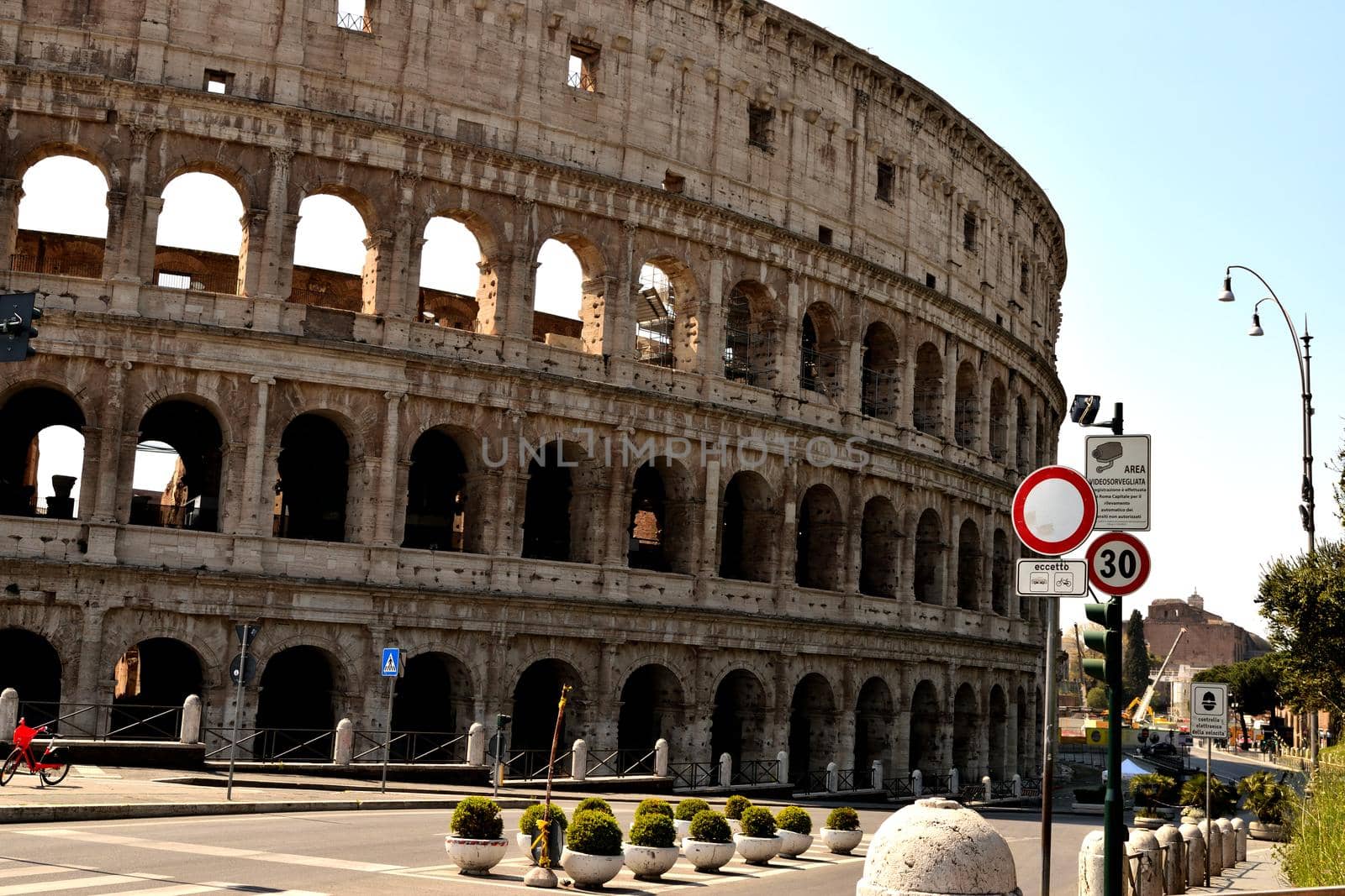 View of the Colosseum without tourists due to the lockdown by silentstock639