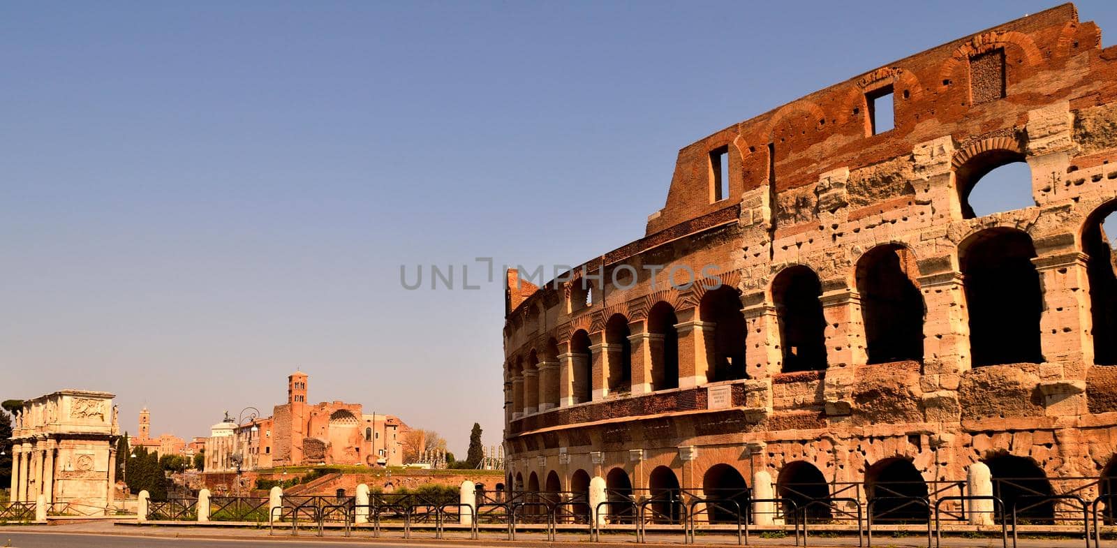 View of the Colosseum without tourists due to the lockdown by silentstock639