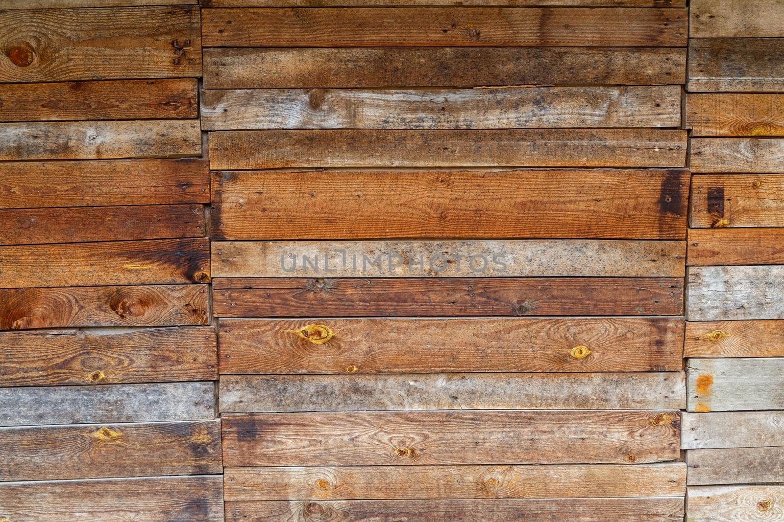orange uncoated wooden planks wall suface texture and background.