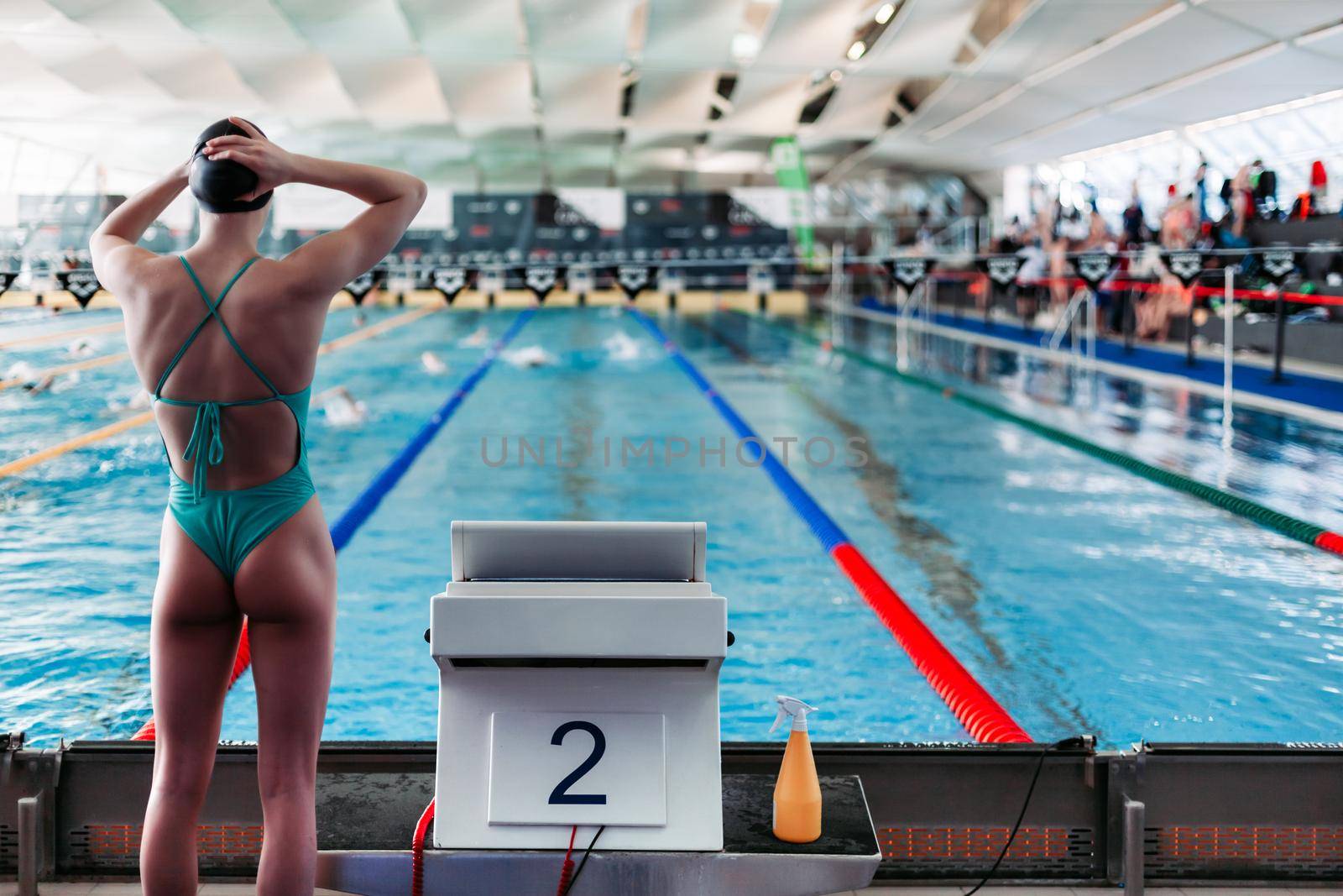 competitive swimming in the pool during training.