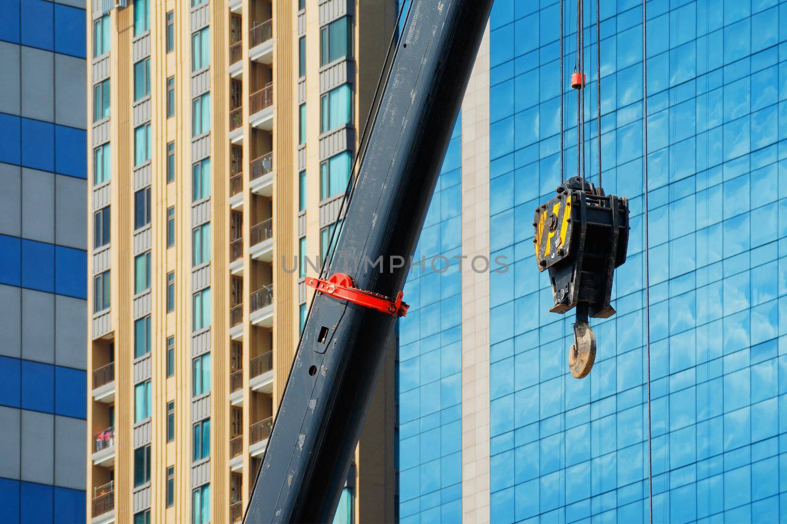 Construction crane With a background of tall buildings