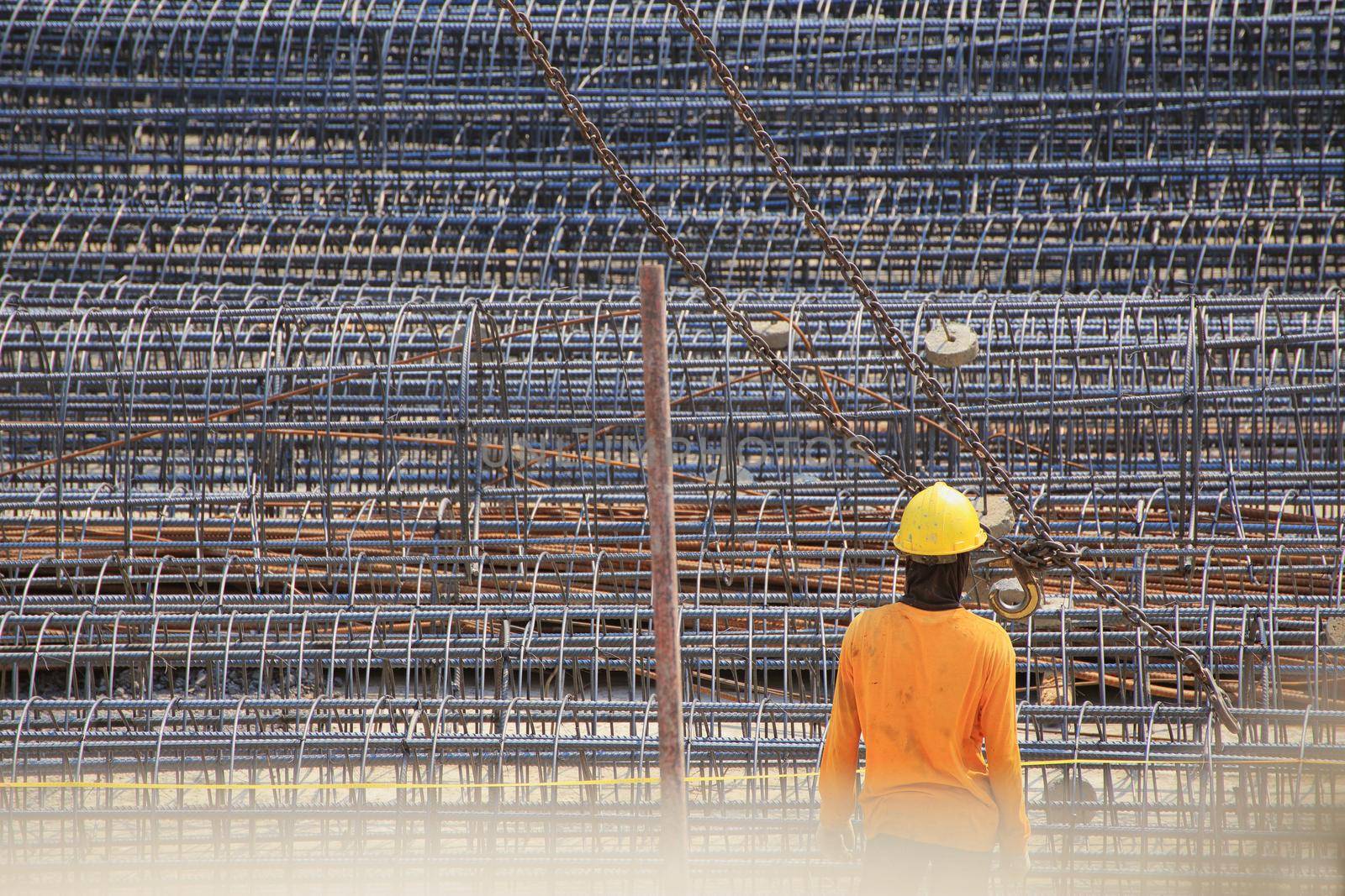 Construction worker And steel bars for tall building structures