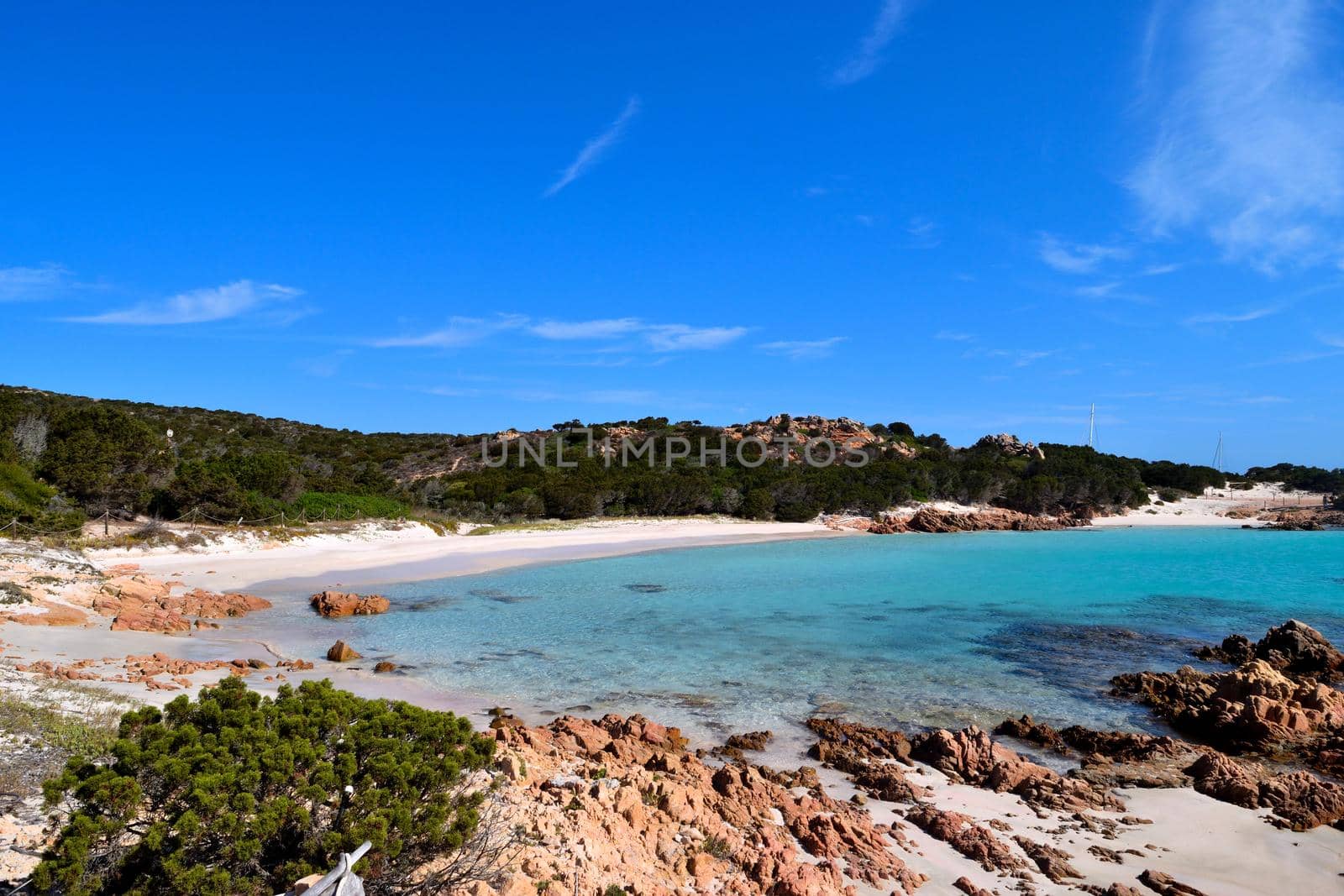 View of the wonderful Pink Beach in Costa Smeralda, Sardinia, Italy by silentstock639