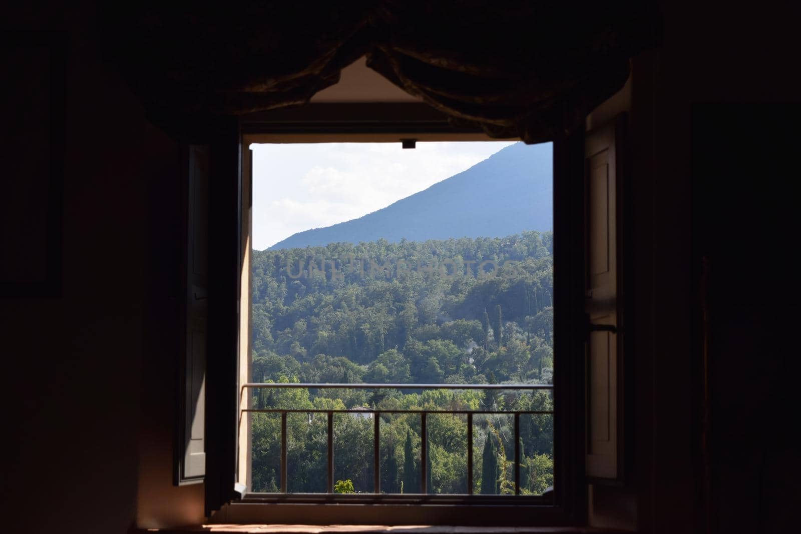 View of an ancient medieval village in the Tuscan countryside. by silentstock639