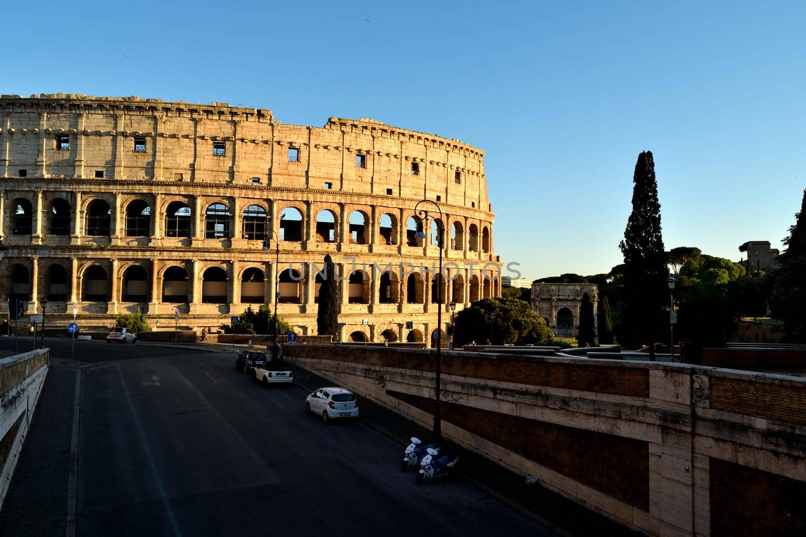 View of the Colosseum without tourists due to the phase 2 of lockdown by silentstock639