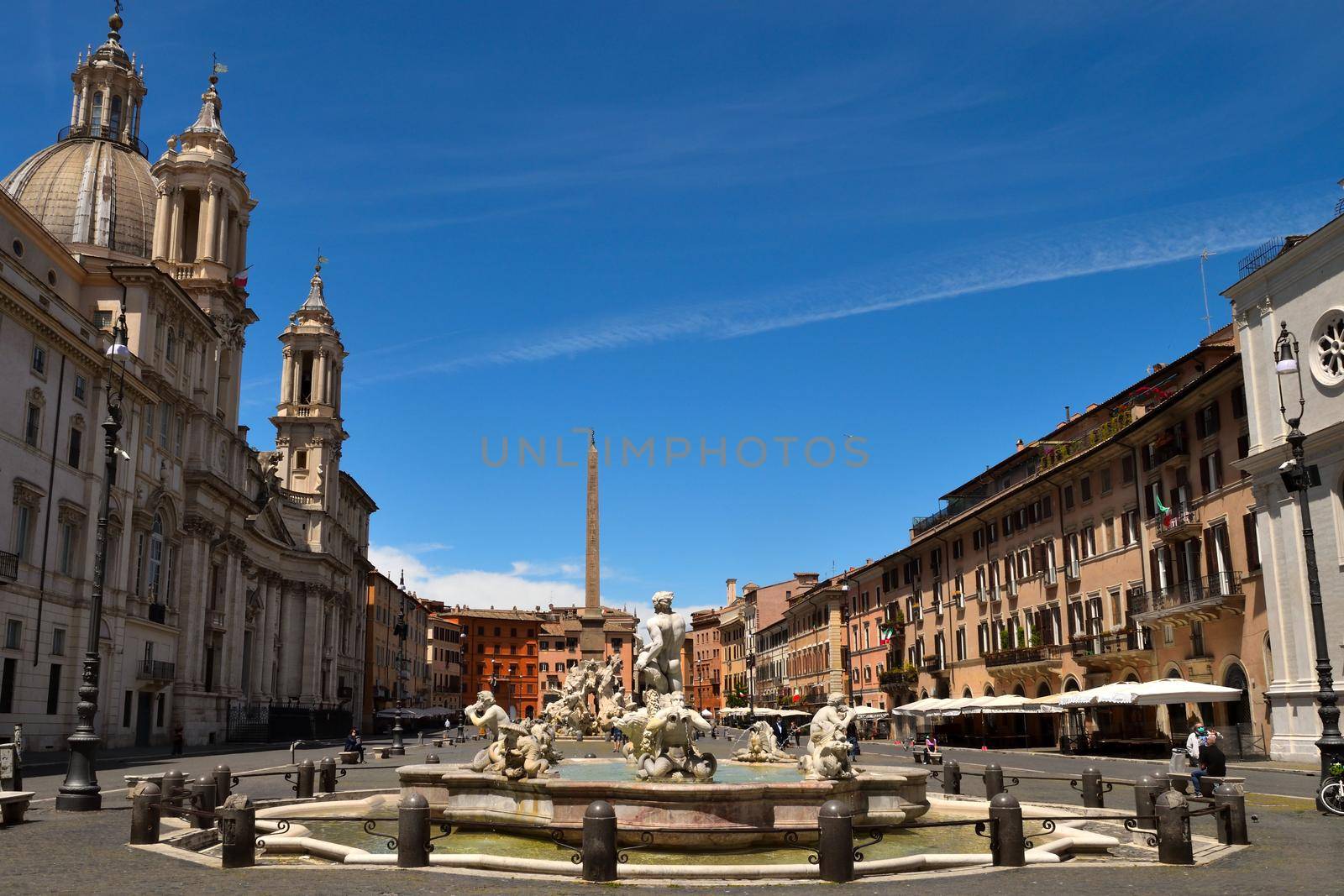 View of the Navona Square without tourists due to phase 2 of the lockdown by silentstock639