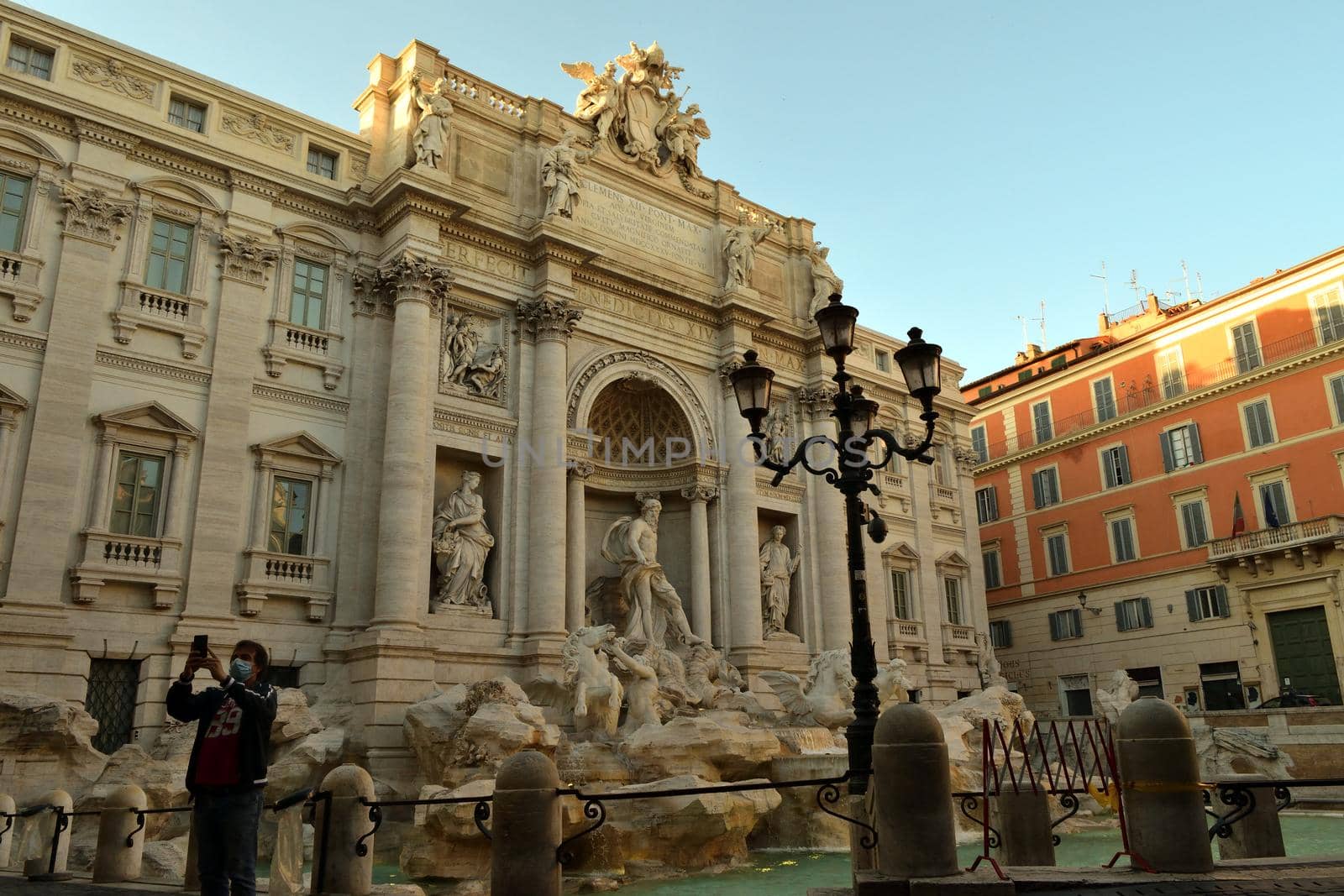 View of the Trevi fountain without tourists due to phase 2 of the lockdown by silentstock639