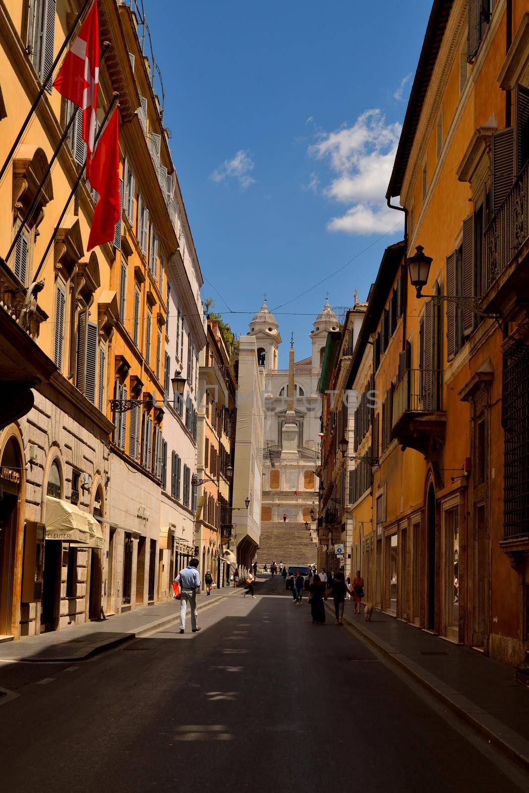 View of the Via dei Condotti and Piazza di Spagna without tourists due to the phase 2 of lockdown by silentstock639