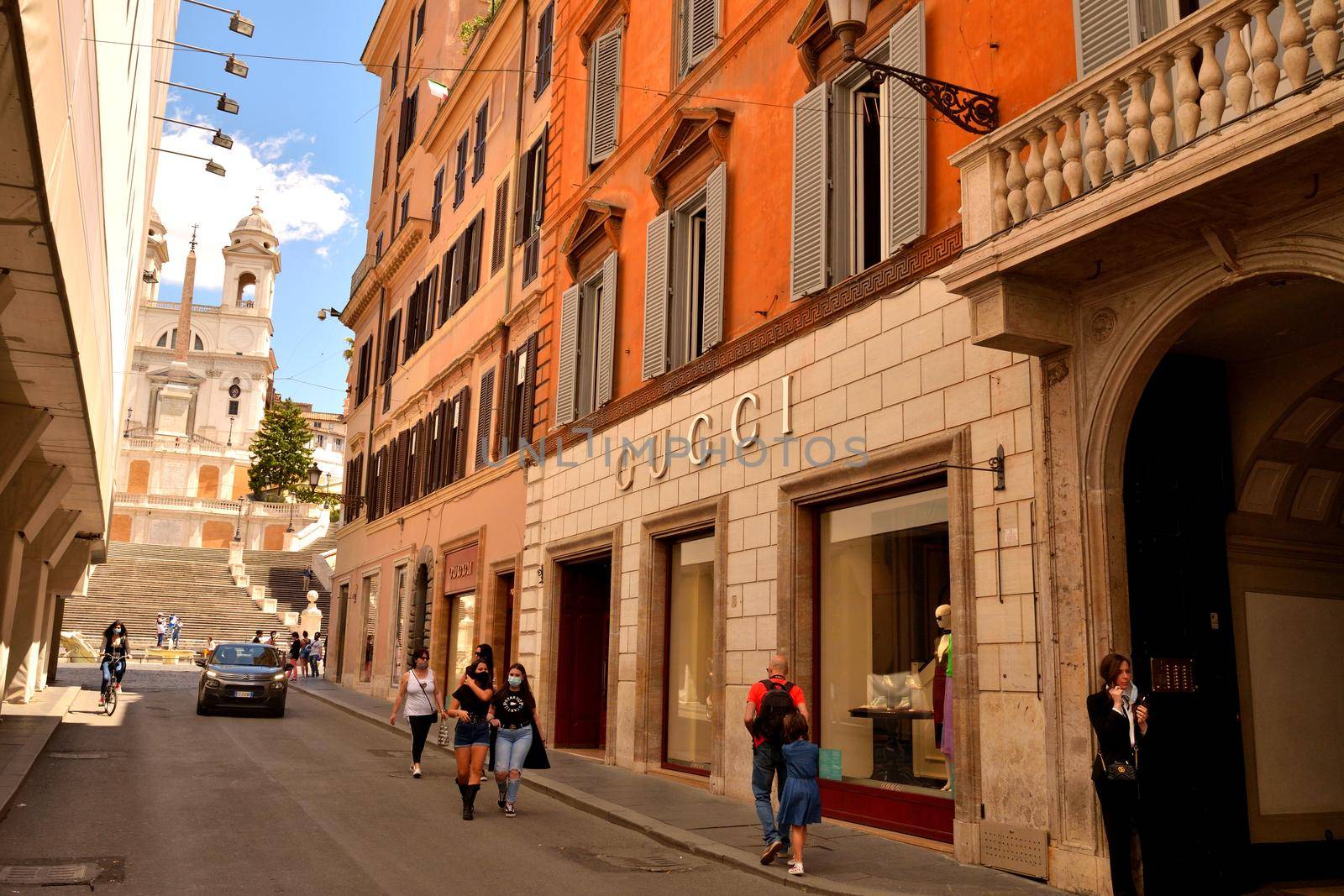 View of the Via dei Condotti and Piazza di Spagna without tourists due to the phase 2 of lockdown by silentstock639