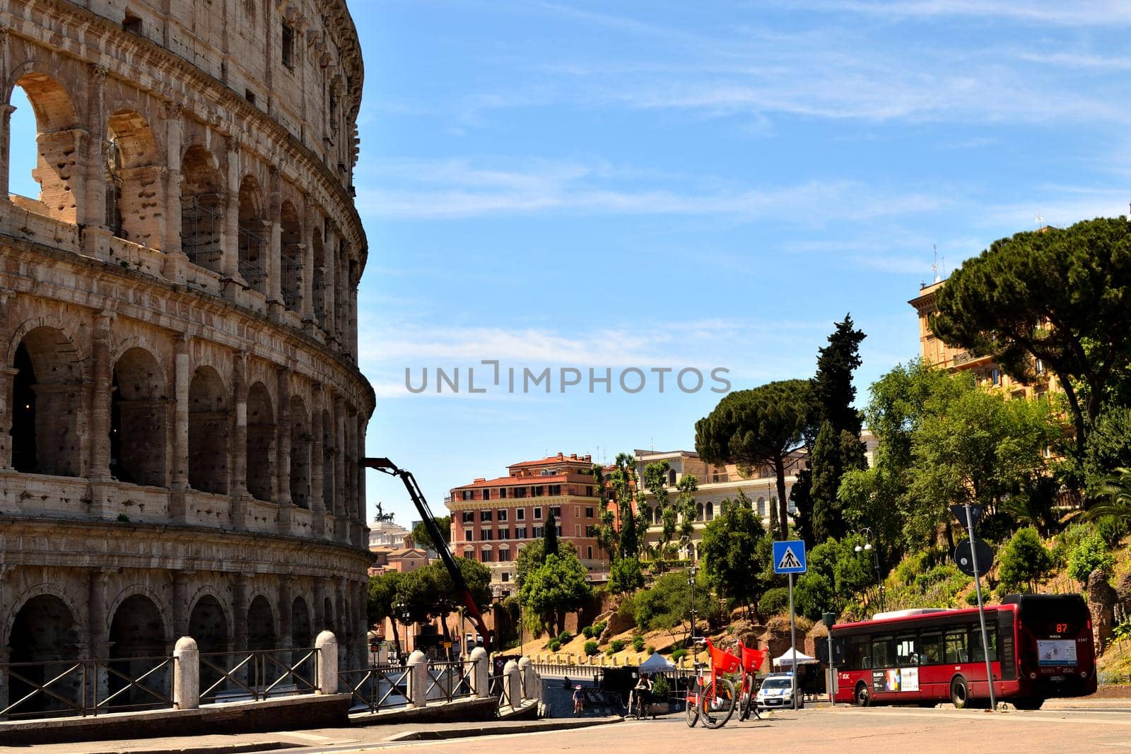 View of the Colosseum without tourists due to the phase 2 of lockdown by silentstock639