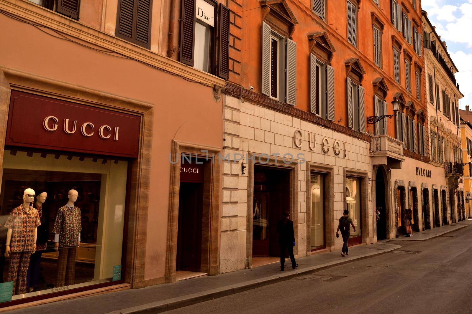 View of the Gucci store in Via dei Condotti without tourists due to the phase 2 of lockdown by silentstock639