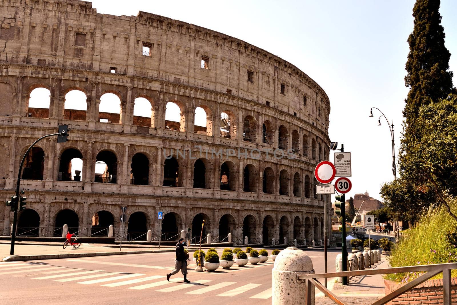 View of the Colosseum without tourists due to the lockdown by silentstock639