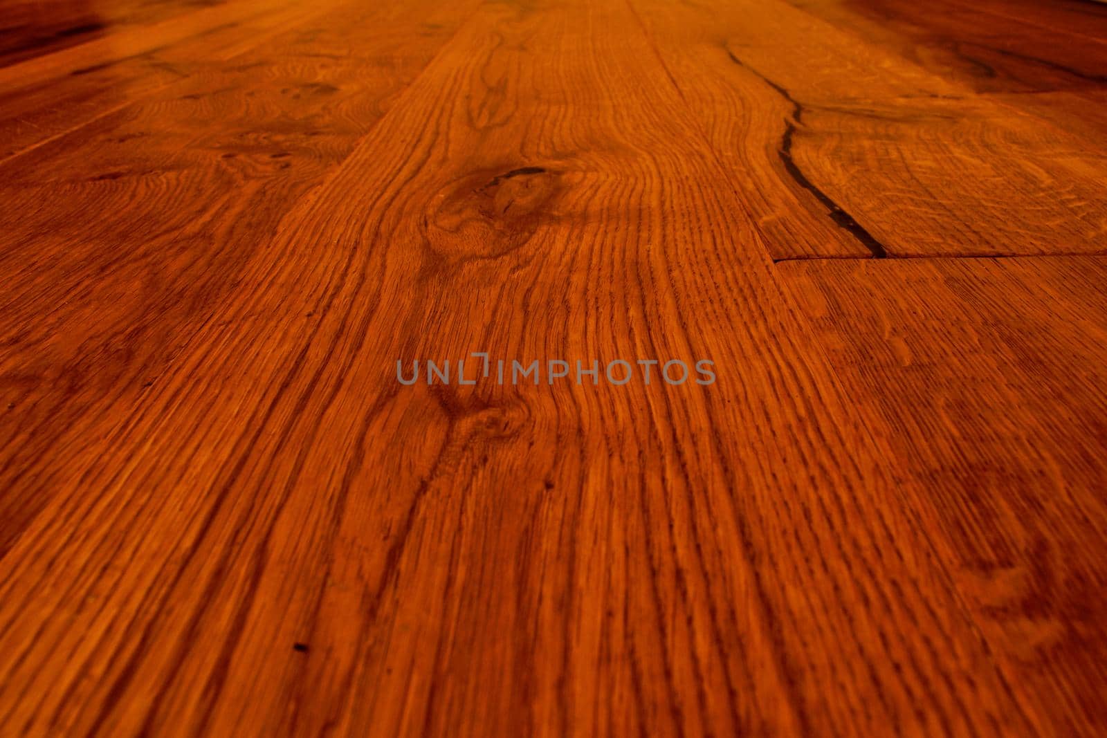 A closeup of a parquet floor with its natural veins.