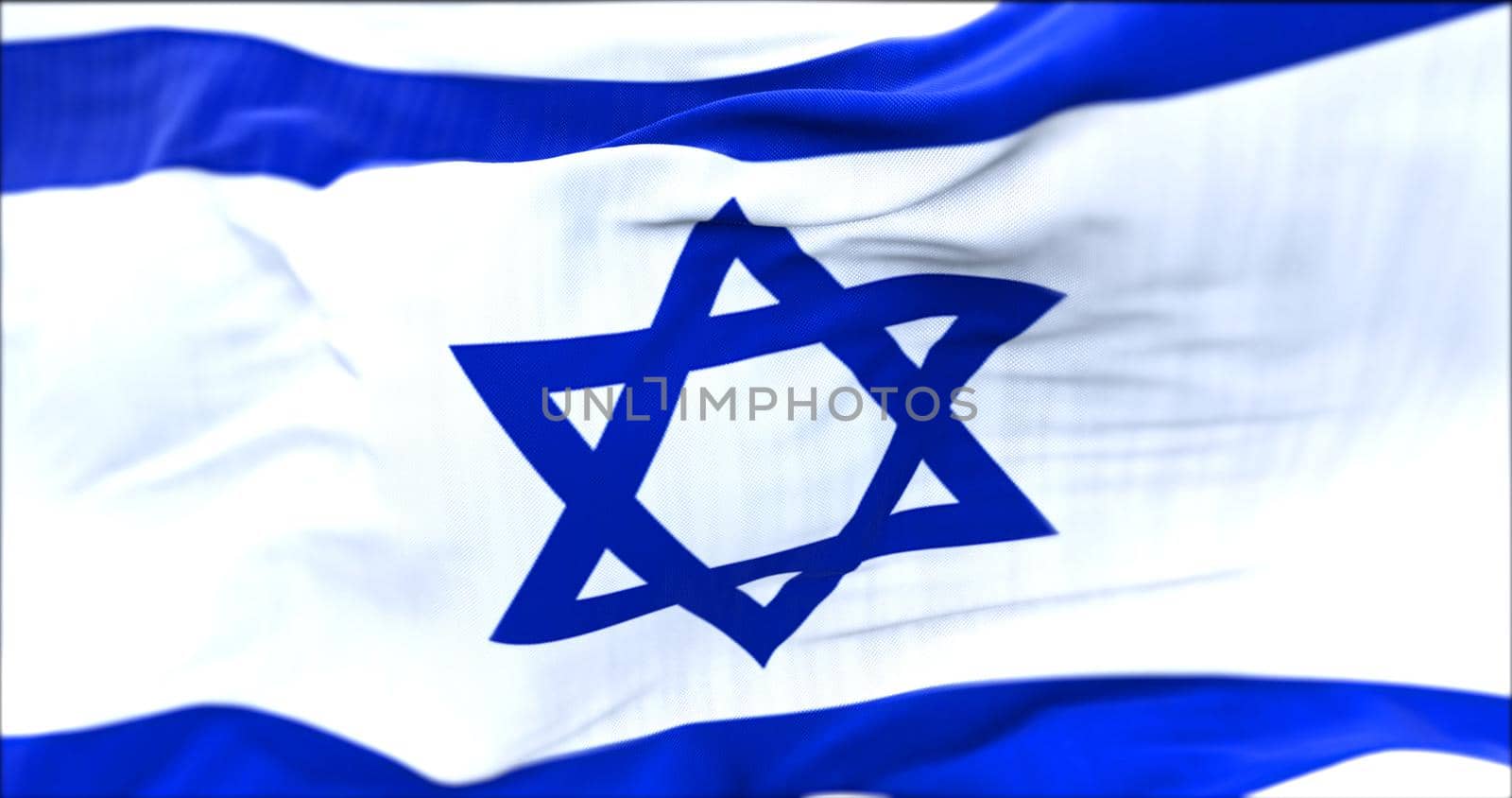 close up view of the Israel flag waving in the wind. Selective focus.