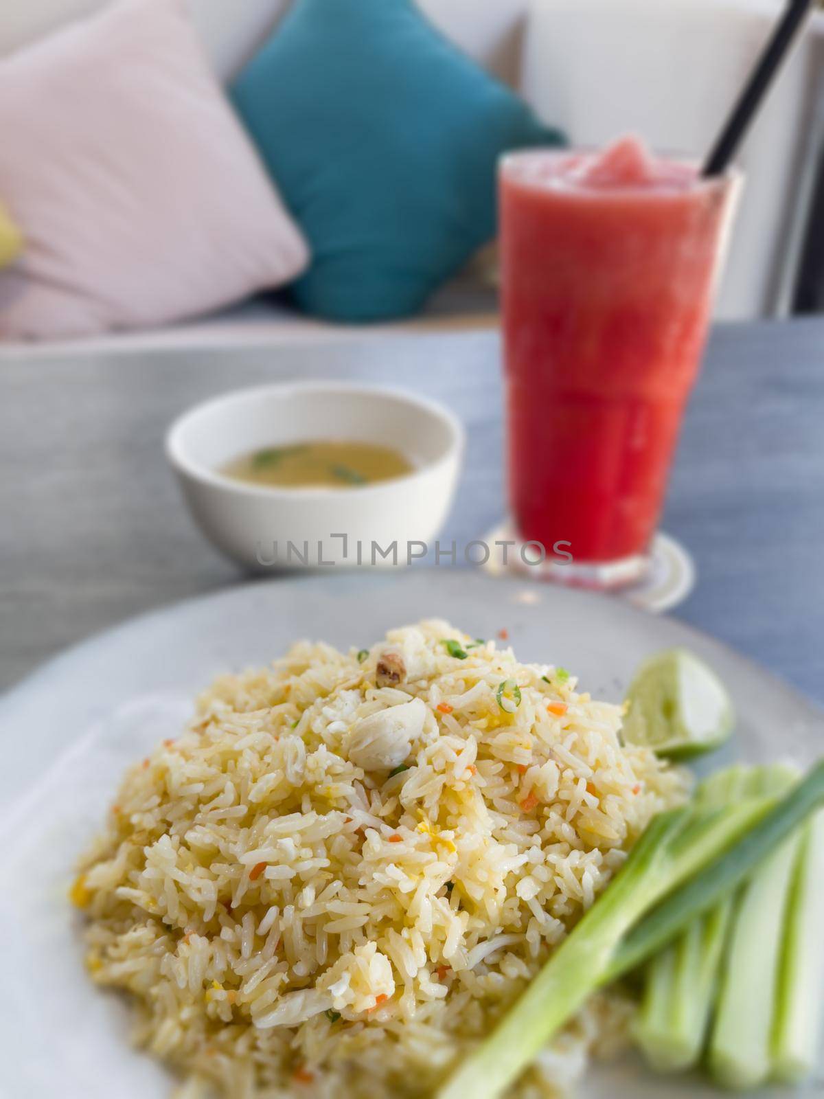 Fried rice on white plate by punsayaporn