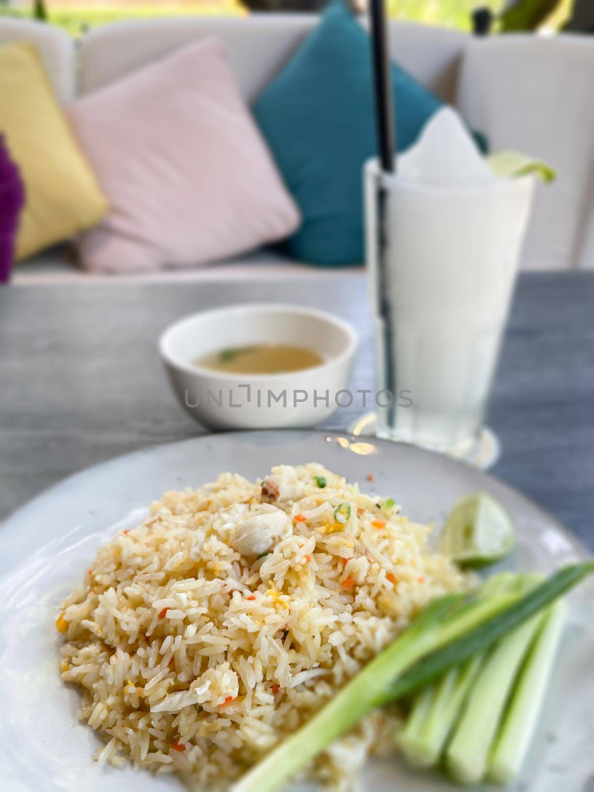 Fried rice on white plate, stock photo