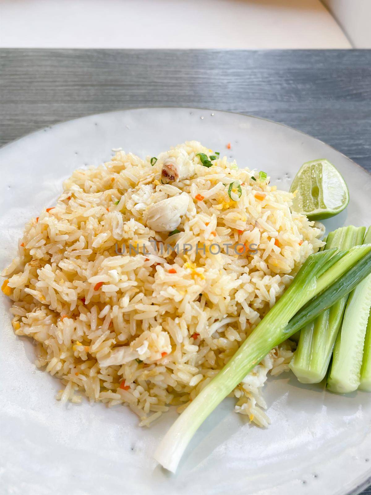 Fried rice on white plate by punsayaporn