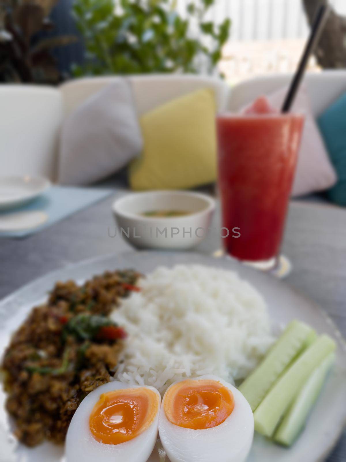 Thaifood basil chicken with boiled egg, stock photo