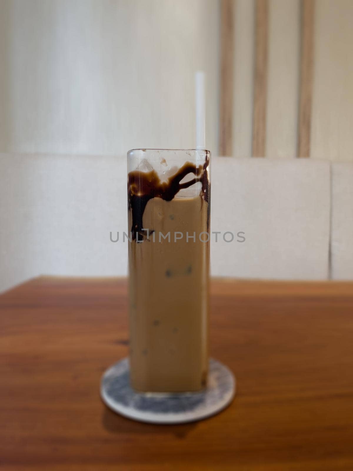 Iced coffee on wooden table, stock photo