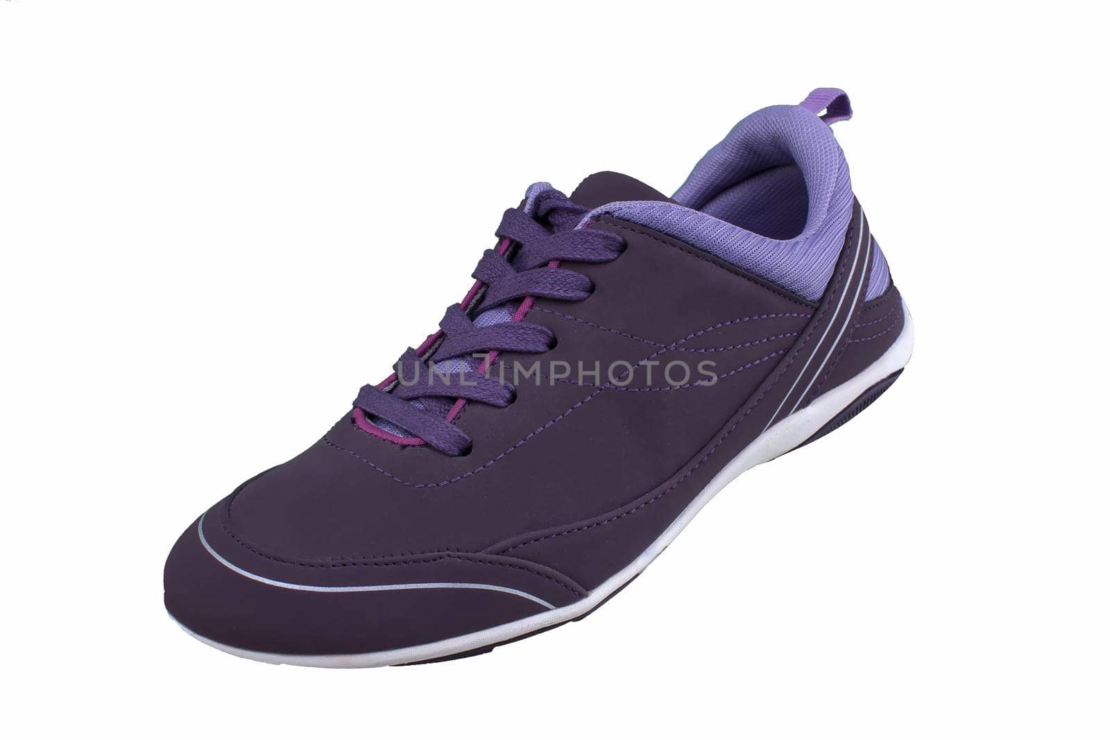 Sneaker purple on a white sole. Sport shoes on a white background.