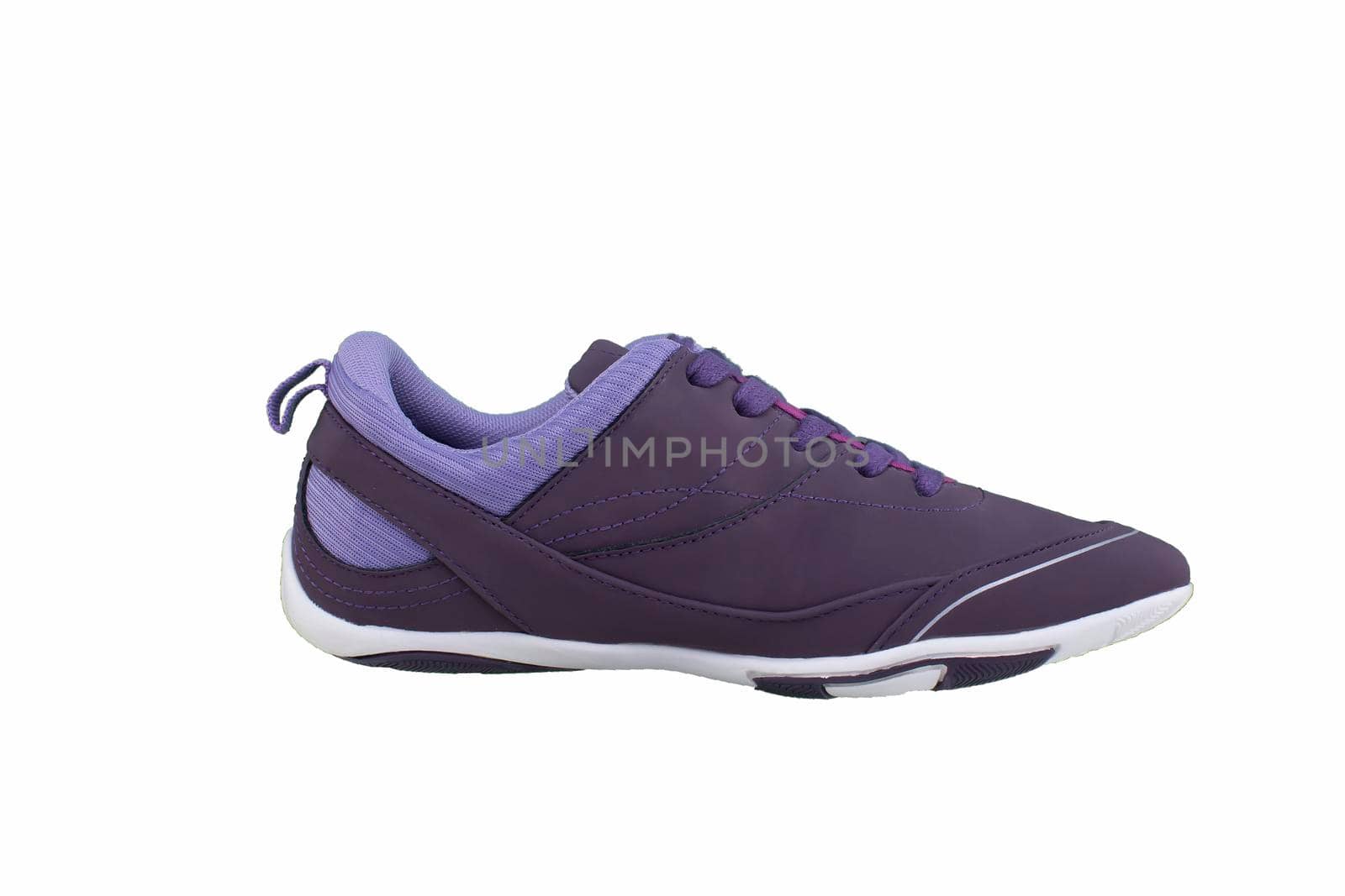 Sneaker purple on a white sole. Sport shoes on a white background.