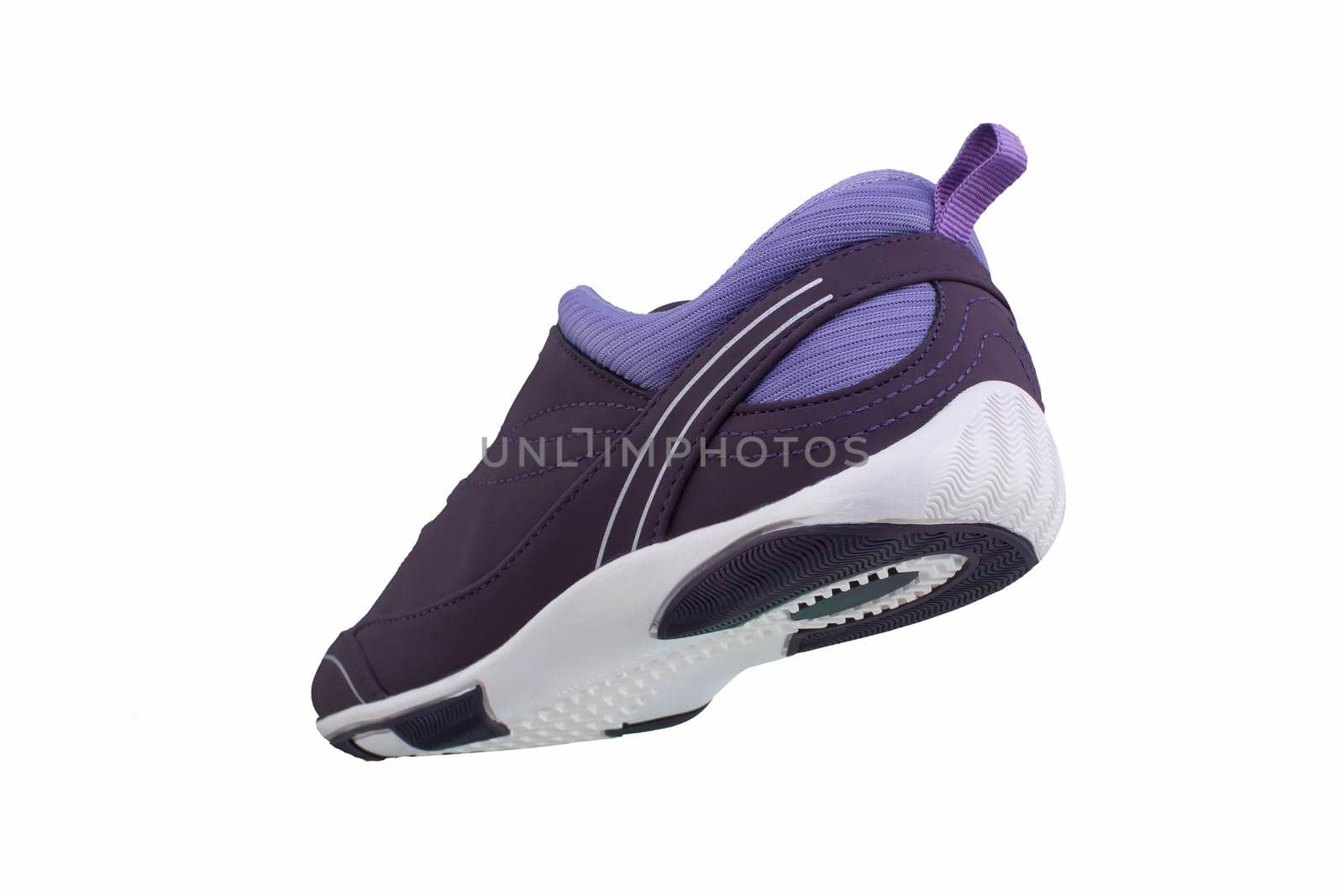 Sneaker purple on a white sole. Sport shoes on a white background.