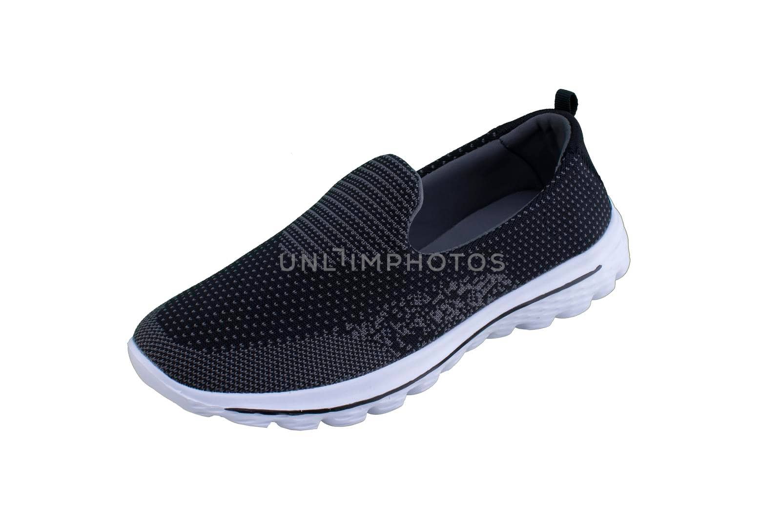 Black sneakers on white soles. Sport shoes on a white background.