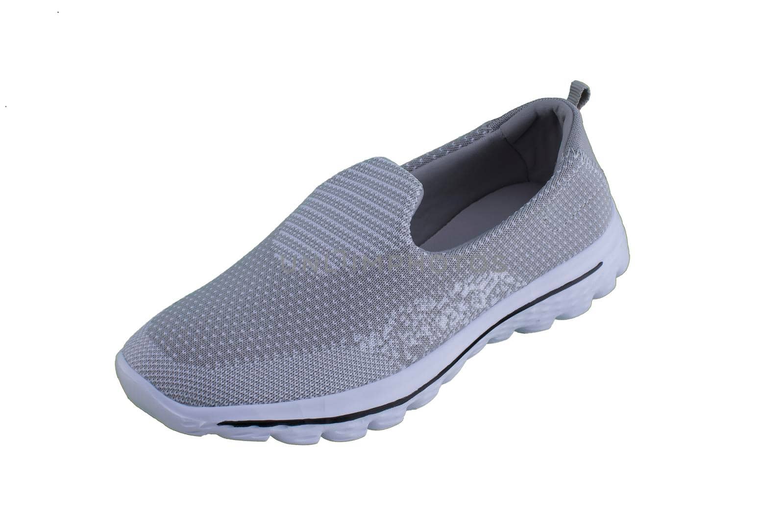 Sneaker gray on a white sole. Sport shoes on a white background.