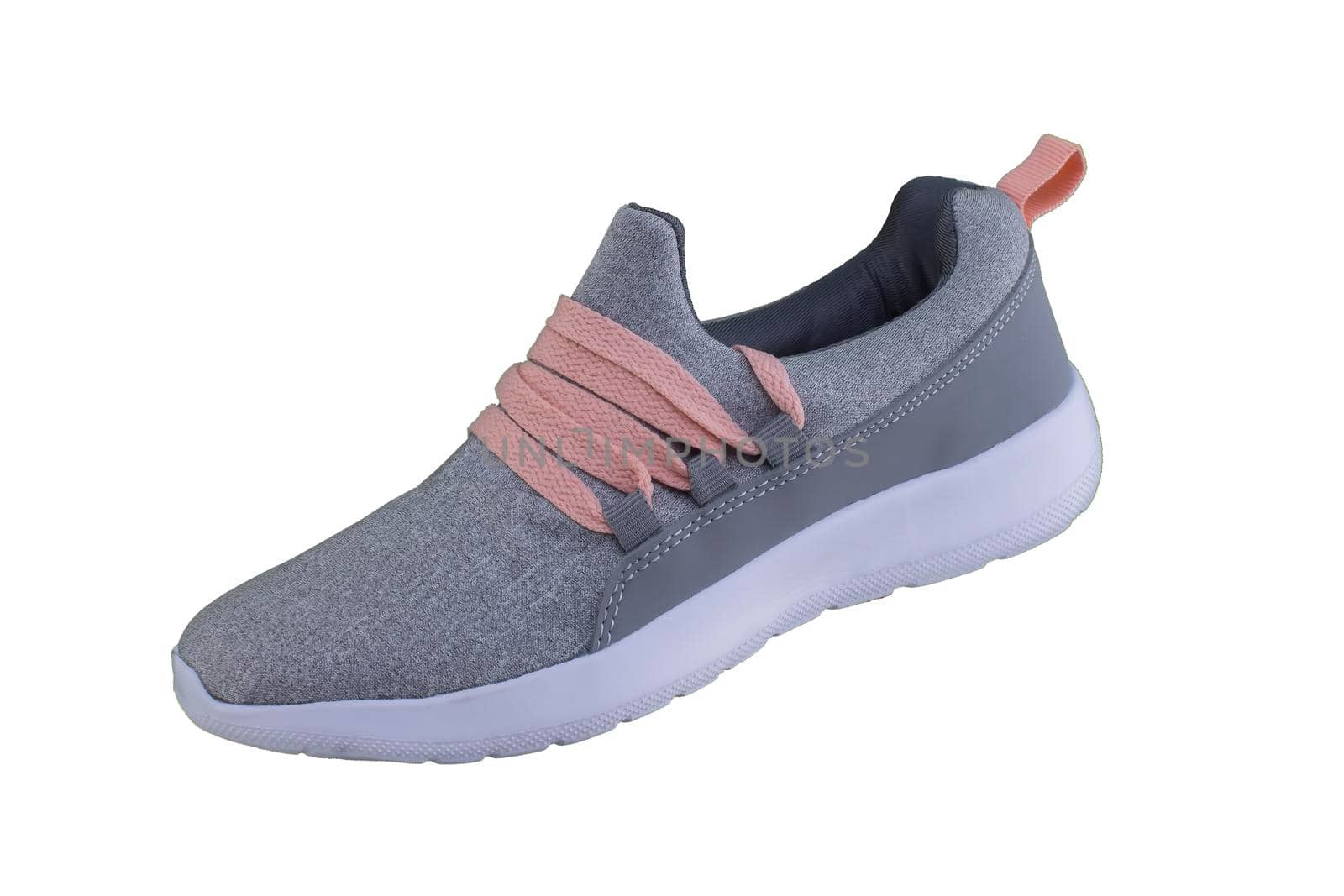 Gray sneaker with orange laces. Sport shoes on white background