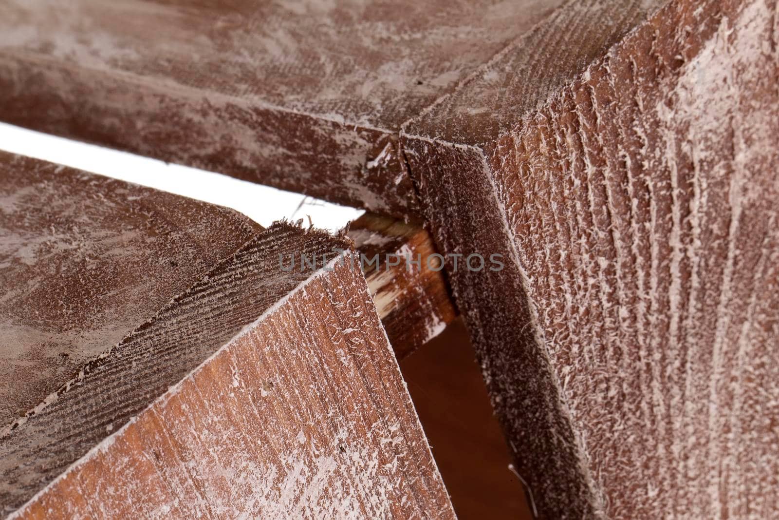 Fragment of a wooden box close-up on a white background