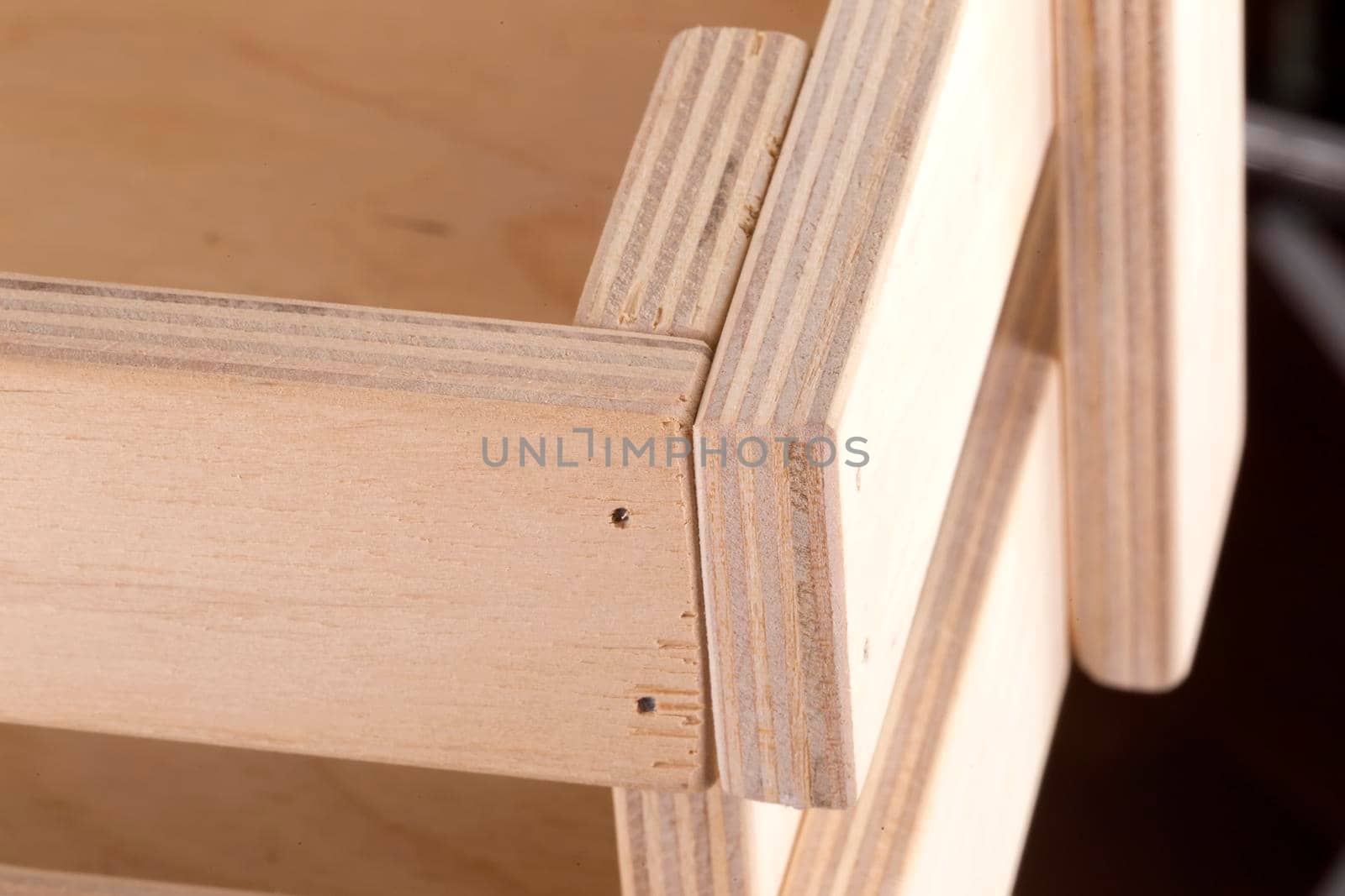 Fragment of a wooden box close-up on a white background